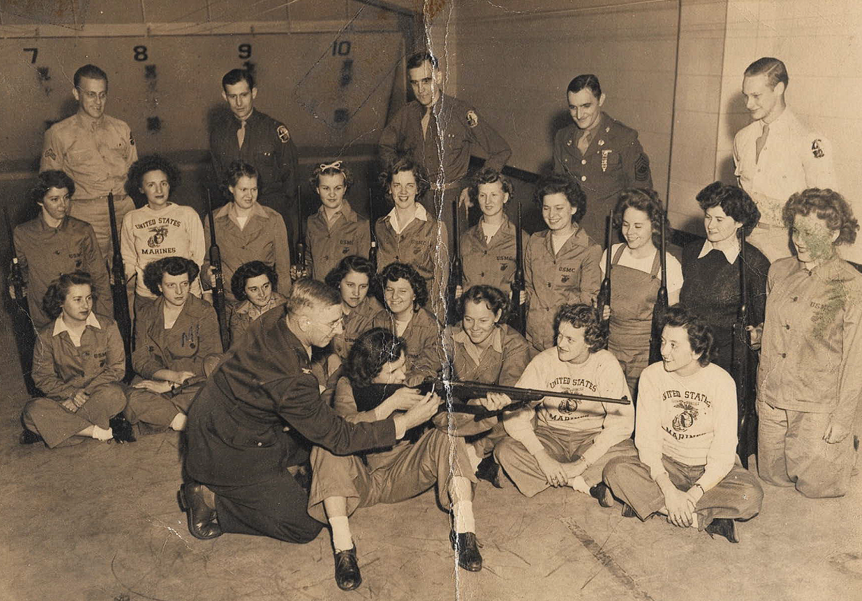 Margeret Evelyn Wilkinson, a descendant of the core Wilkinson family, completes her Marine corps. Rifle training during World War II. 