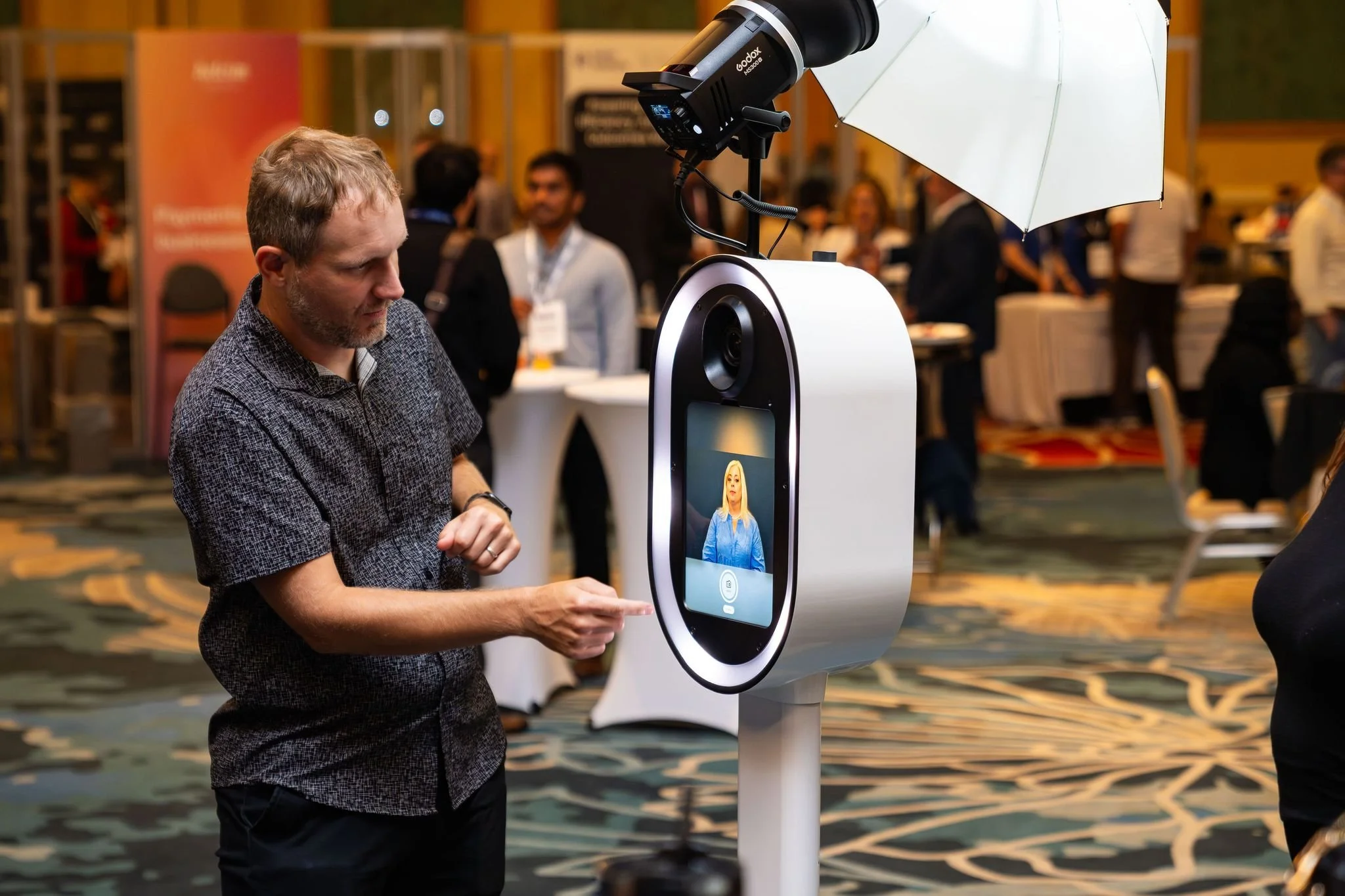 What Is a Trade Show Headshot Booth and Why Are Exhibitors Lining Up for Them?