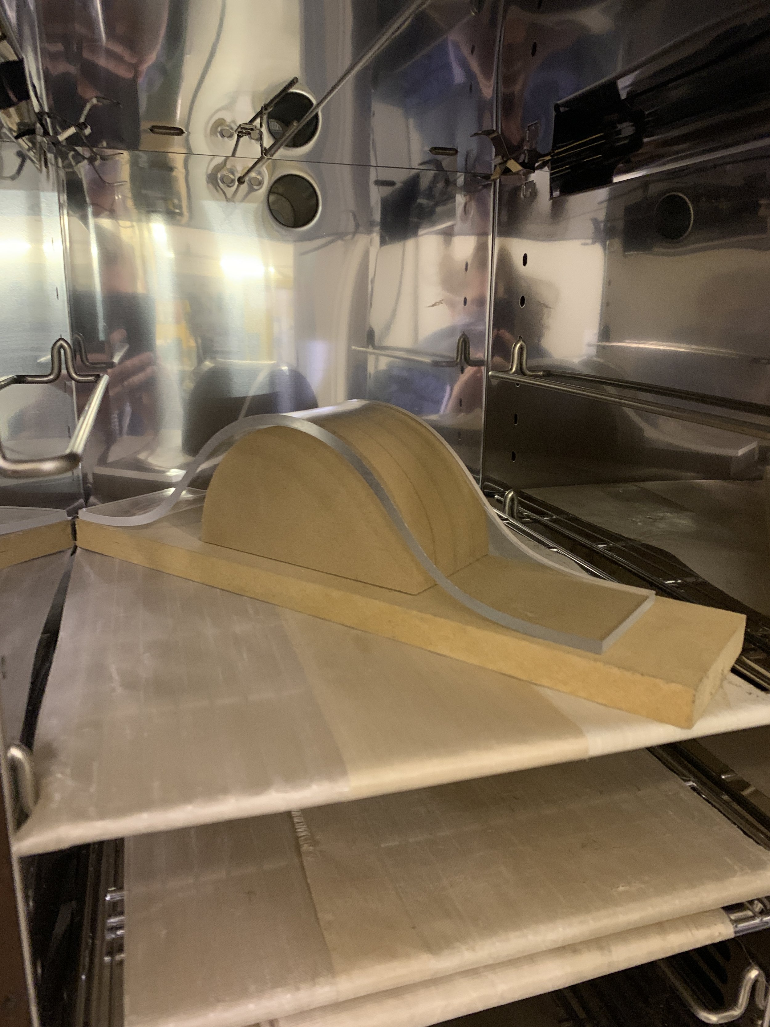 Demonstrating the limits of slump molding acrylic in an oven.
