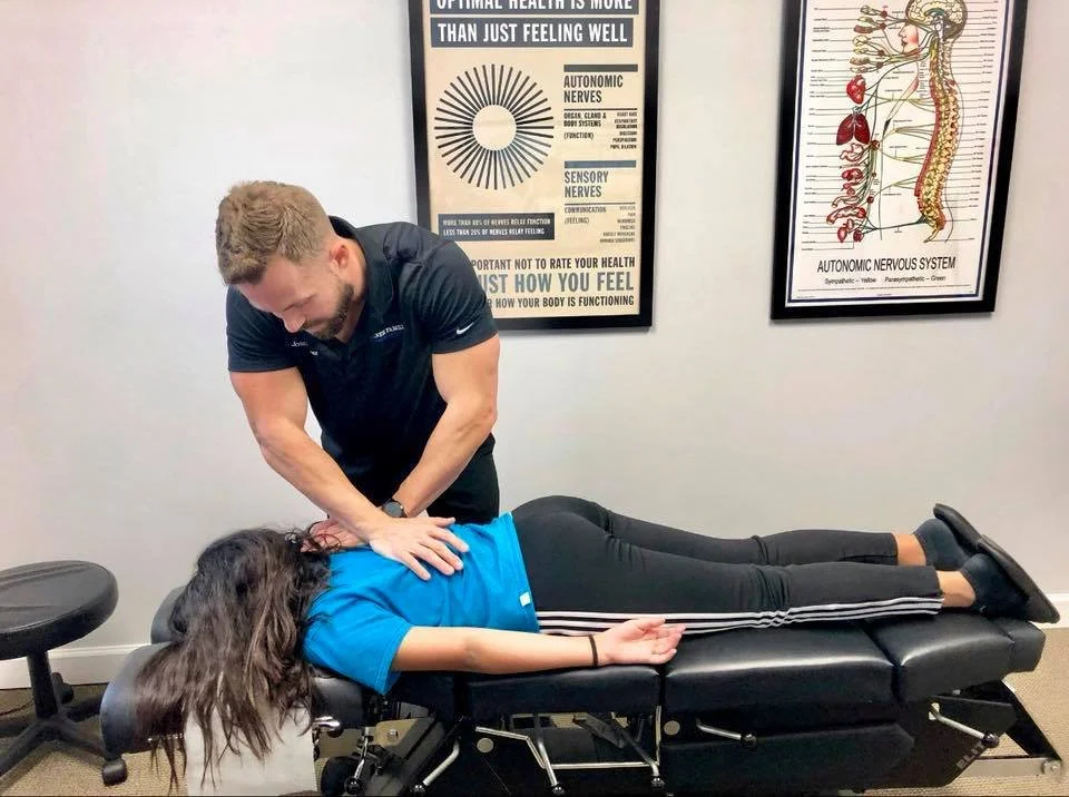 Dr. Jonathan Ozner adjusts a patient at his practice in Sunrise, Florida.