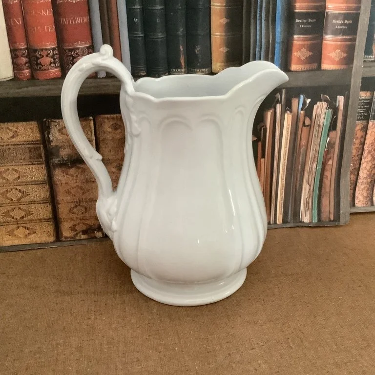 (#23.64) St. Louis Shape Table Pitcher; 9-3/4” H to top of thumbrest; impressed J. Edwards St. Louis Shape.  C. 1860.  Fine condition.  $125.