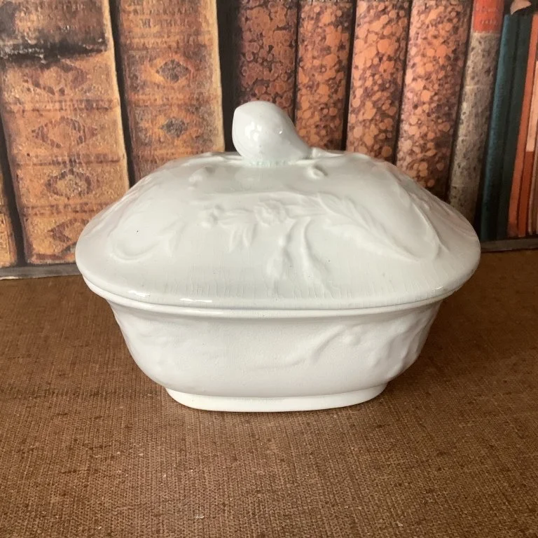 (#23.51) Laurel Soap Dish; 4” H, 5-3/8” L; unmarked, but attributed to Wedgwood & Co., c. 1860.  Fine condition with fine overall crazing and lid has sharper embossing than base.  *SOLD*