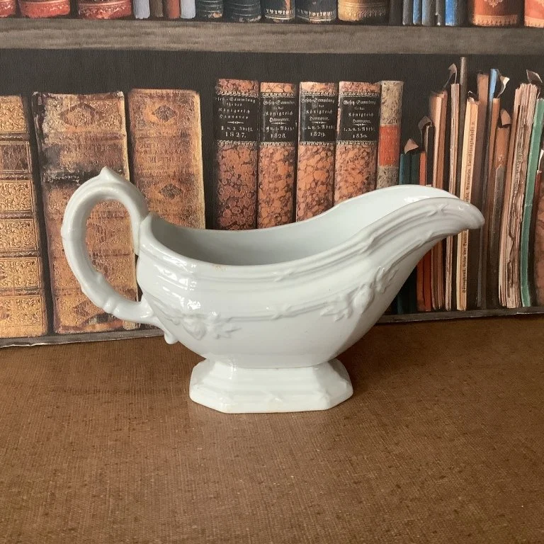 (#23.59) Fig/Union Shape Gravy Boat; 9” L; impressed Davenport with registry diamond.  Registered 1856.  Fine condition.  *SOLD*
