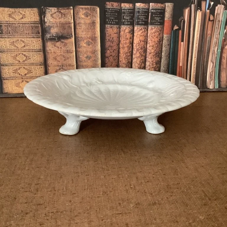 (#23.59) Lily Pad Low Compote (Donut Stand); 9-1/2” Diam., 2-1/4”H; unmarked, but attributed to J.W. Pankhurst; c.  1850s.  Fine condition with some fine crazing and some light wear on high points of embossed flowers.  SOLD