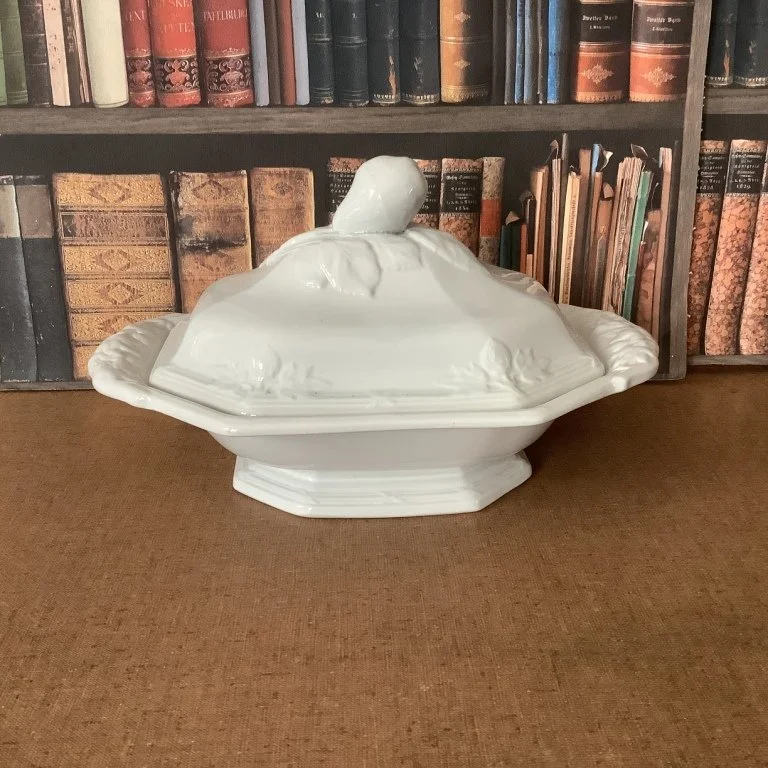 (#23.59) Fig/Union Shape Covered Vegetable; 13-1/4” L handle to handle, 7-1/2”H; impressed Davenport mark and registry diamond.  Registered 1856.  Fine condition.  *SOLD*