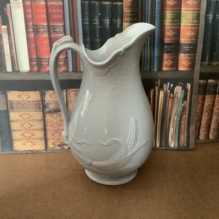 (#23.64) Corn & Oats Ewer/Wash Pitcher; 12-1/2” to center of pour spout; impressed Davenport with registry diamond.  Registered 1863.  Fine condition.  $125.