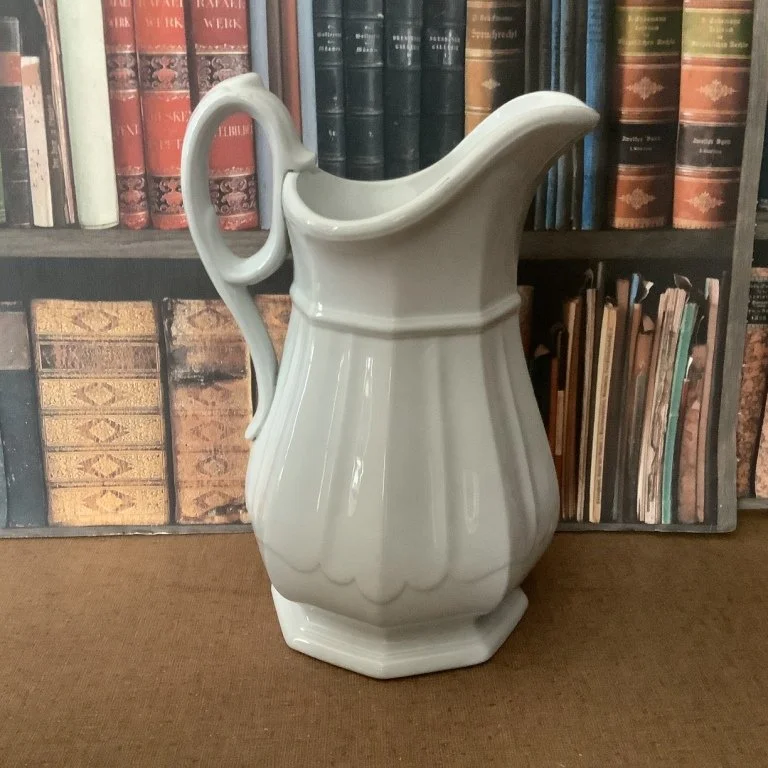 (#23.64) Scalloped Decagon Ewer/Wash Pitcher; 11-7/8” to top of thumbrest; impressed Davenport with registry diamond.  Registered 1853.  Fine condition with some crazing.  $125. 