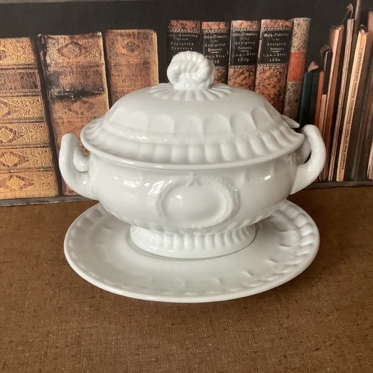 (#23.61) Laurel Wreath/Victory Shape Sauce Tureen with Undertray; 6-1/2” H, 7-1/2” handle to handle, undertray 8-1/4” L; base has raised impressed pad mark – Laurel Wreath – Elsmore & Forster, undertray has an impressed Elsmore & Forster Laurel Wreat