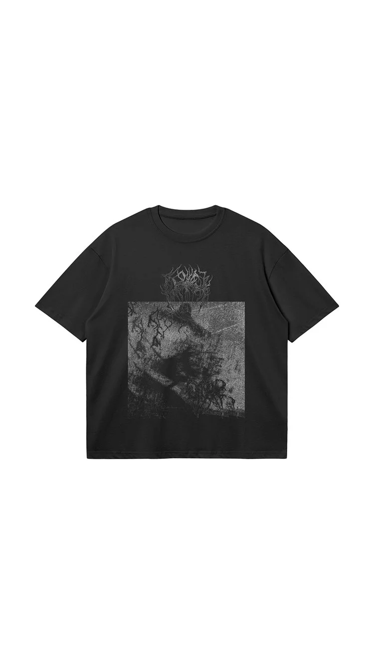 Black T-shirt with a graphic design featuring abstract, dark, textured imagery and stylized text at the top.