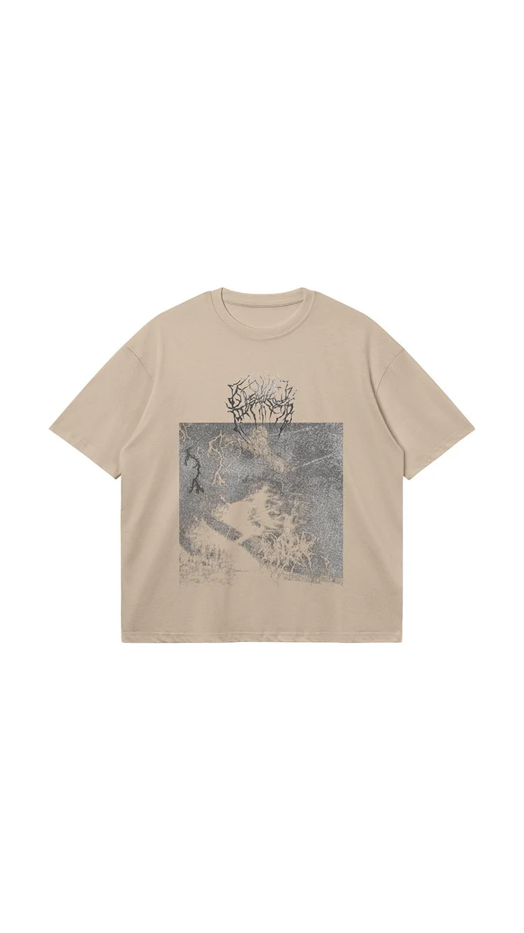 Beige T-shirt with a graphic print of a woman and trees in a vintage style.