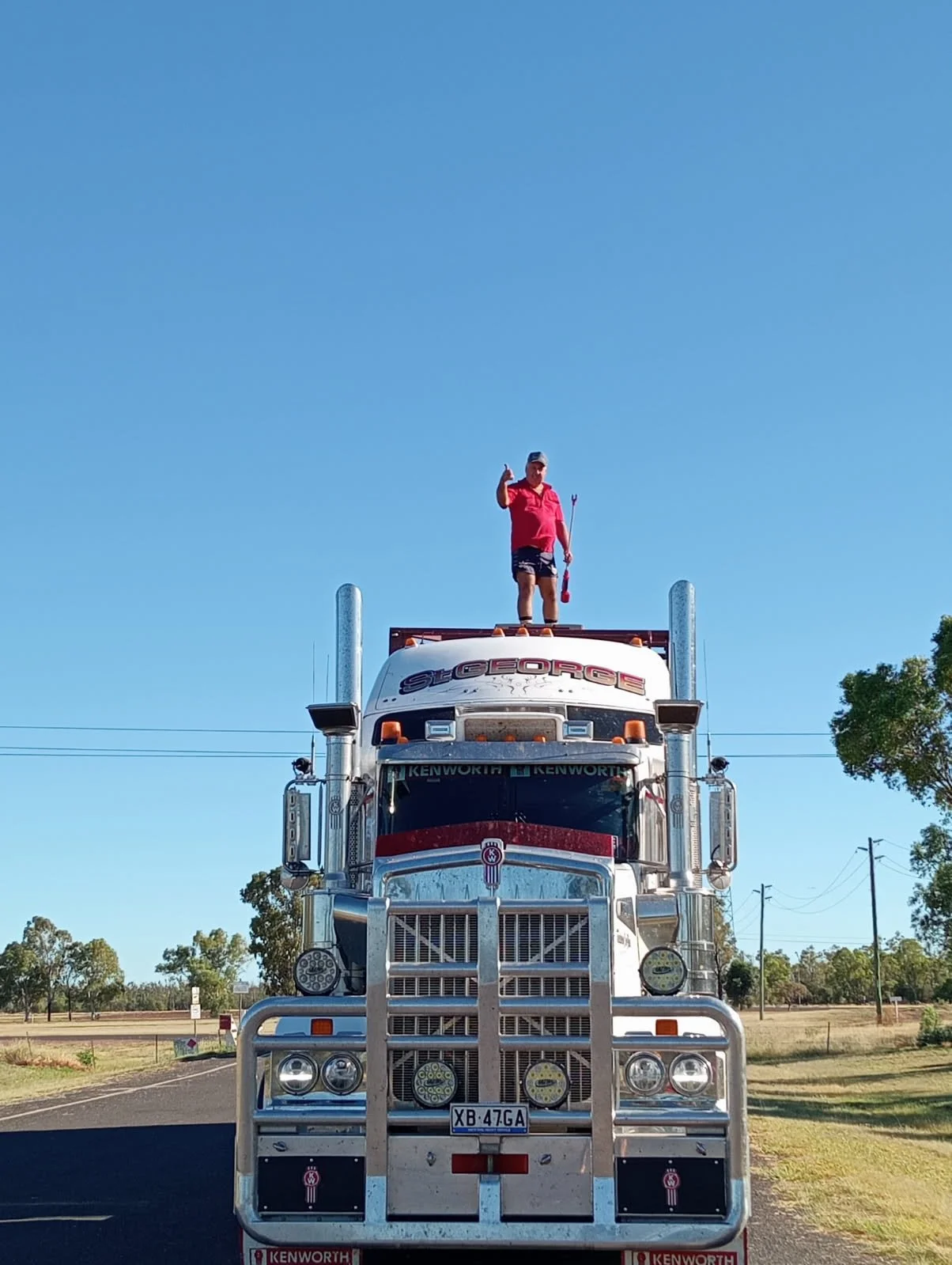 Riding high on his T909.jpeg