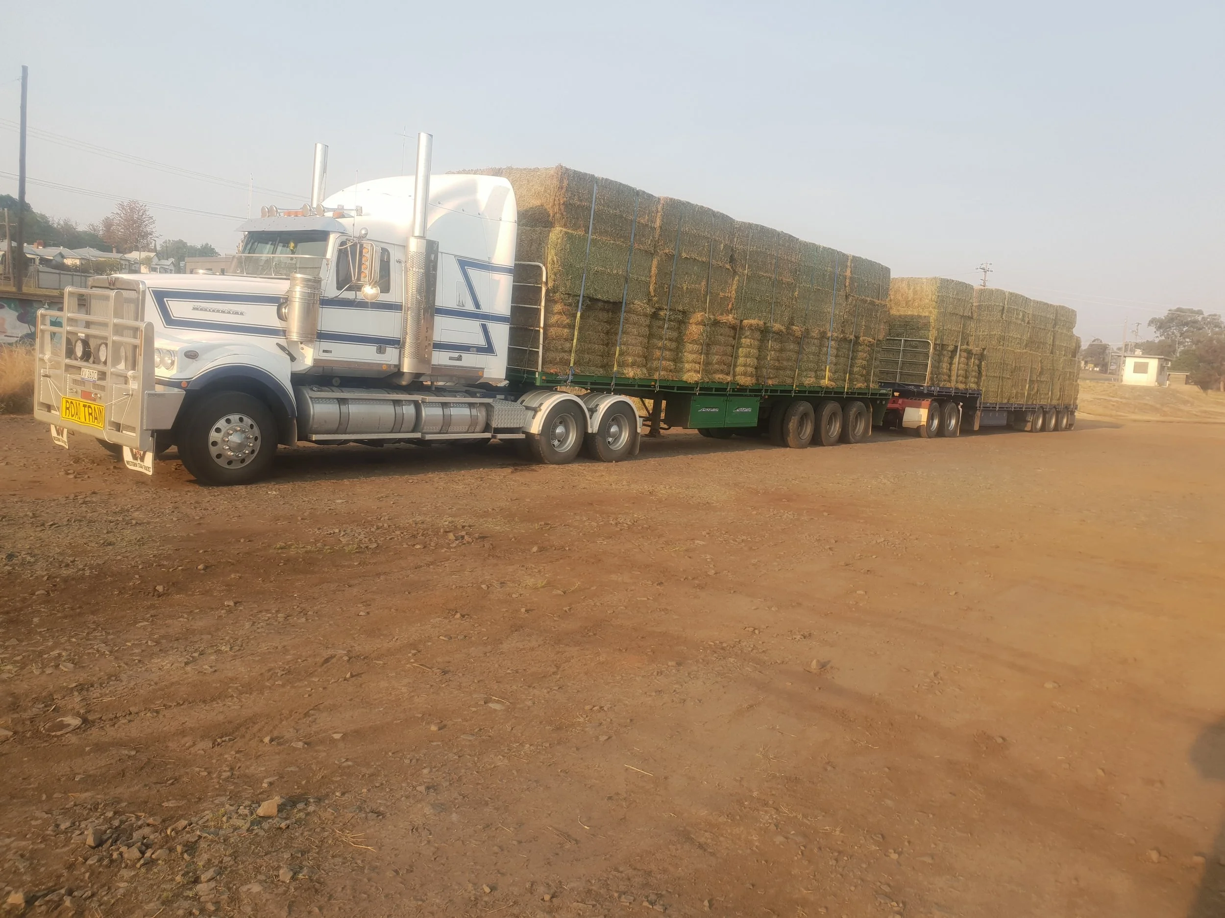 Road train of hay.jpg