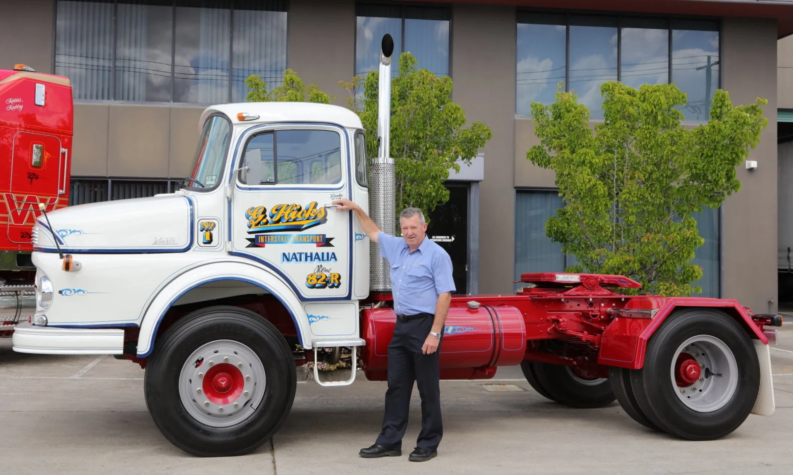 Gerard hicks with his restored 1418 Benz.JPG