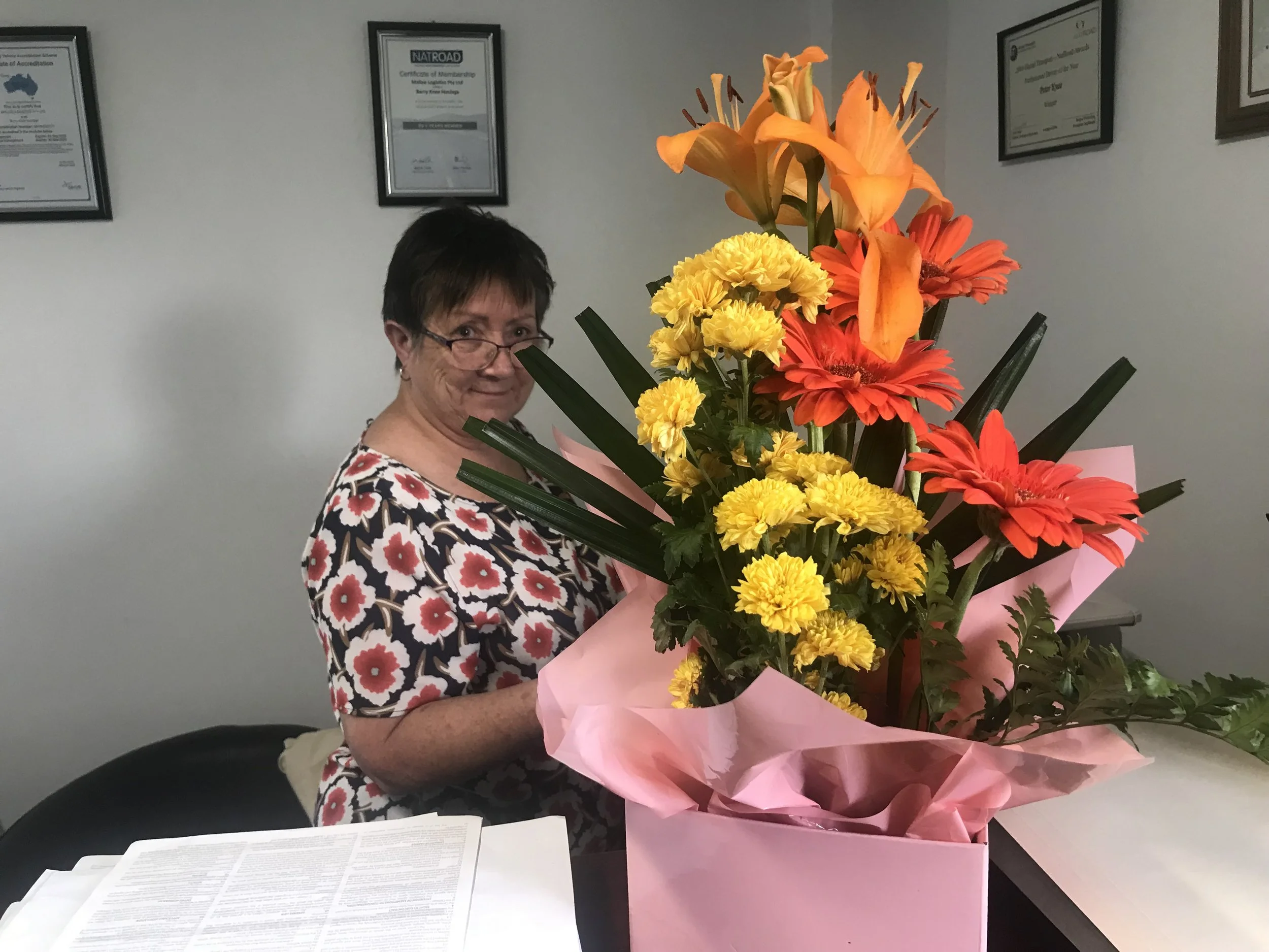 Kathy Knee working in office.jpg