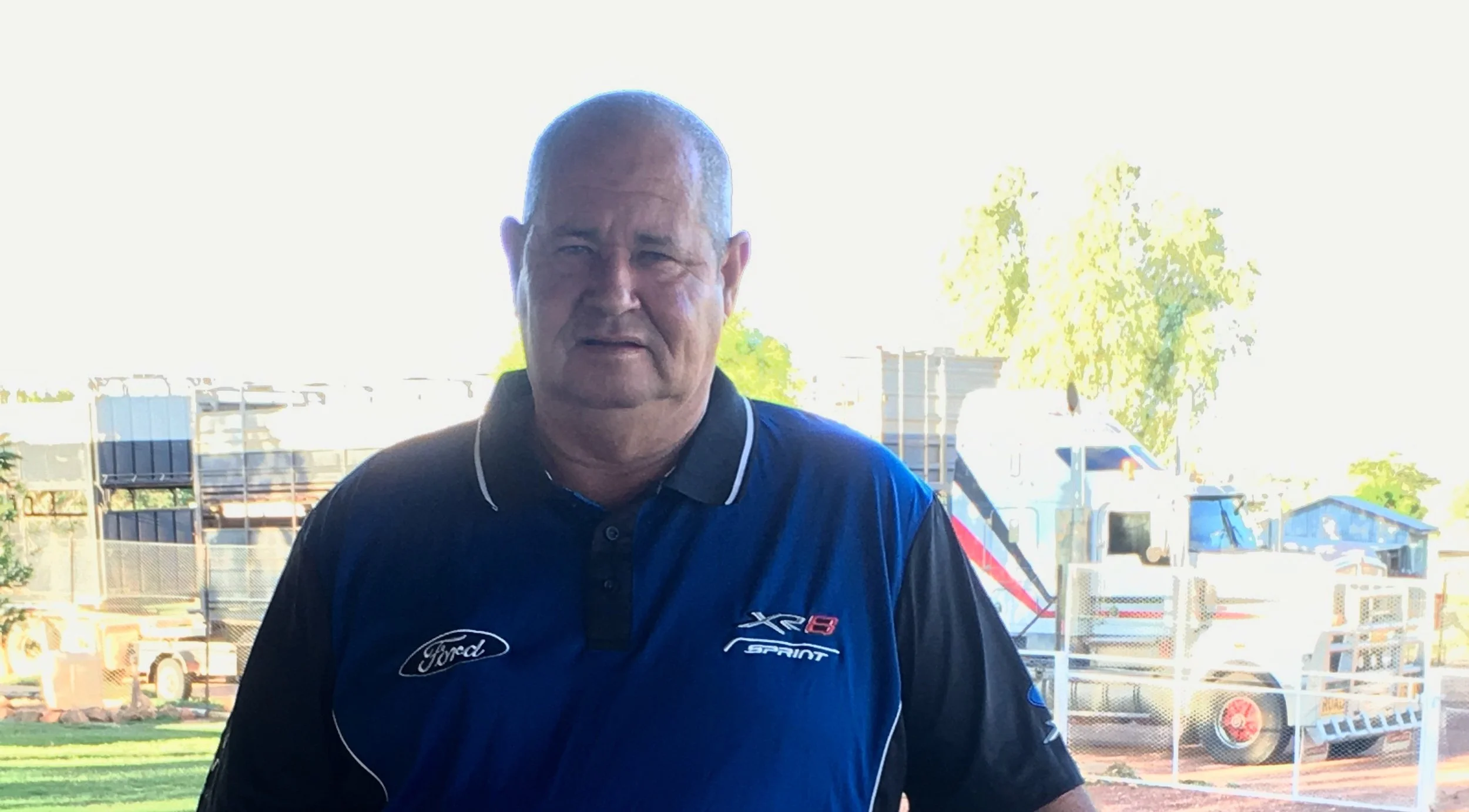 Mal Wyton Muttaburra 24.03.2017 with his Kenworth T904 behind him used to cart cattle.JPG