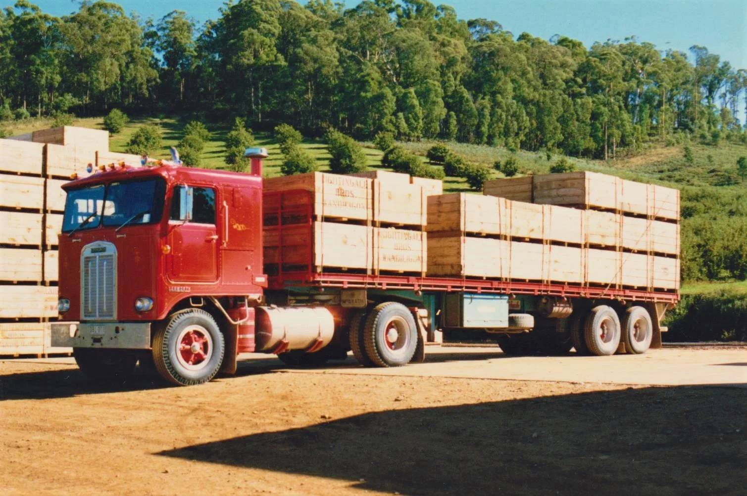 Donald Stewart  Loading 1966 Kenworth truck with bins of apples at Nightingales Stanley orchard 1990s.jpeg