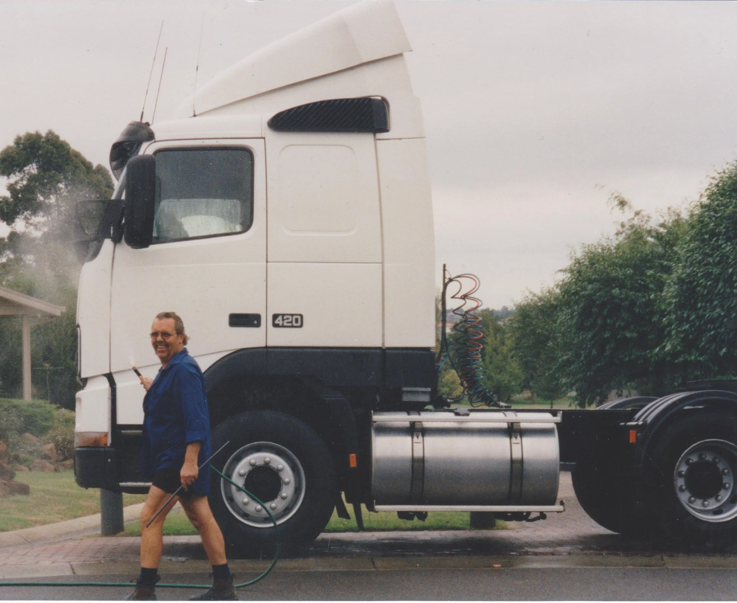 John Edward Norton washing his truck.jpg