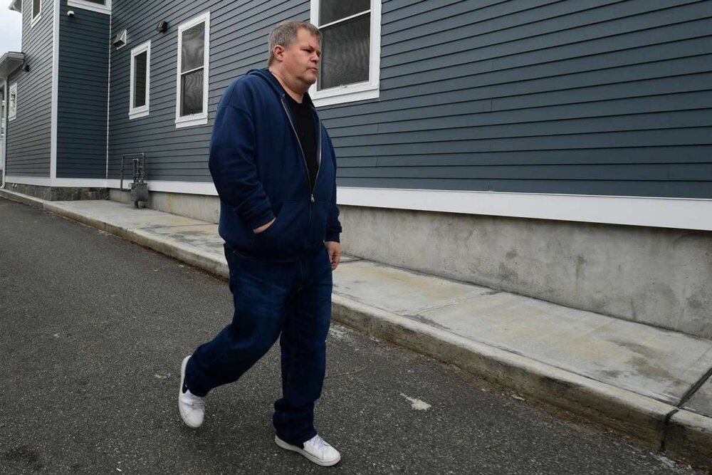  Resident Michael Michaud outside Pacific House Friday, April 16, 2021, a new property with 12 units of housing for formerly homeless individuals in Norwalk, Conn.  Photo: Erik Trautmann / Hearst Connecticut Media 
