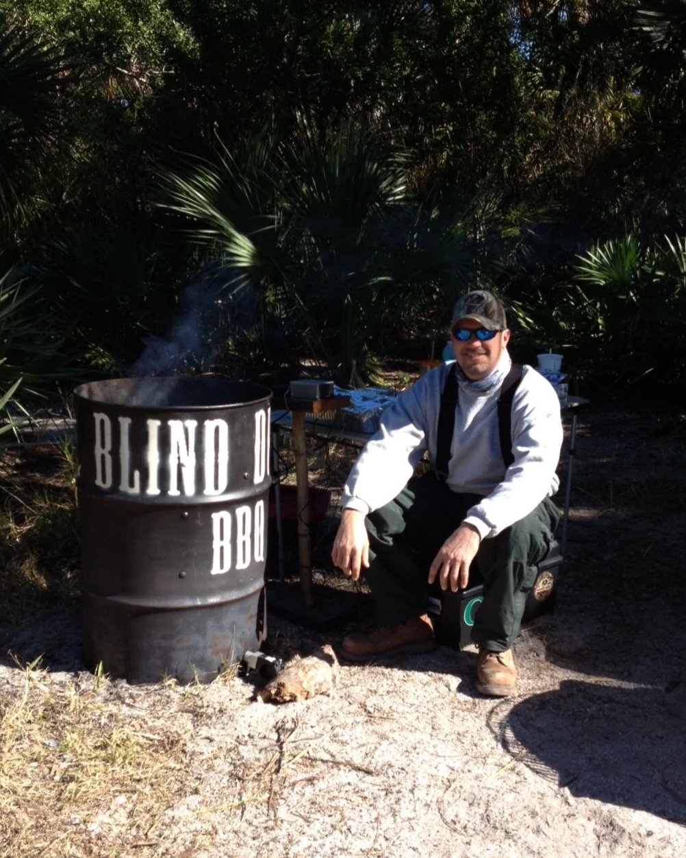 Pit-Matt-ster, Matt Morgan, beside the original Blind Duck BBQ barrel smoker in southern Florida - where it all began.
