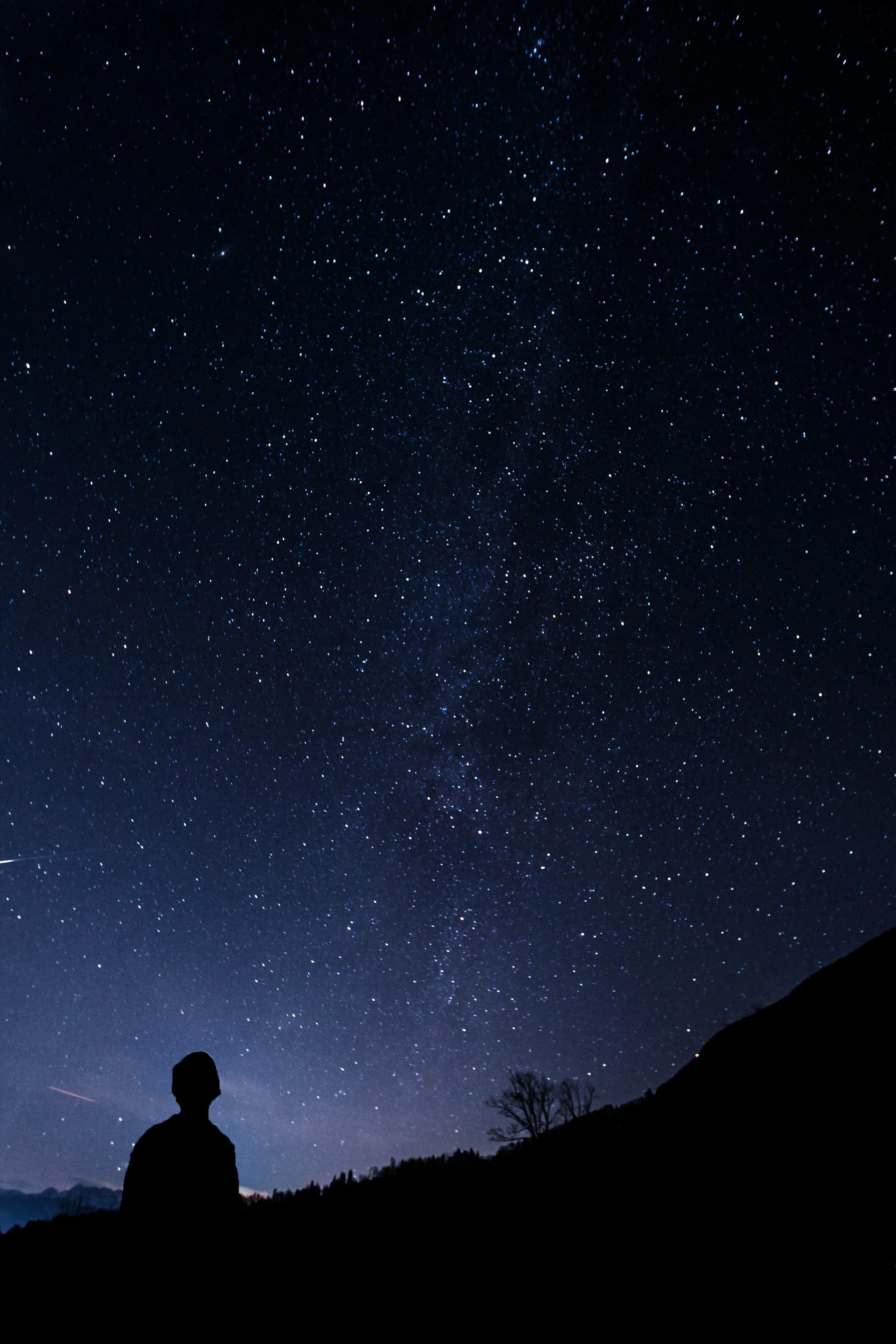 Person looking at a night sky