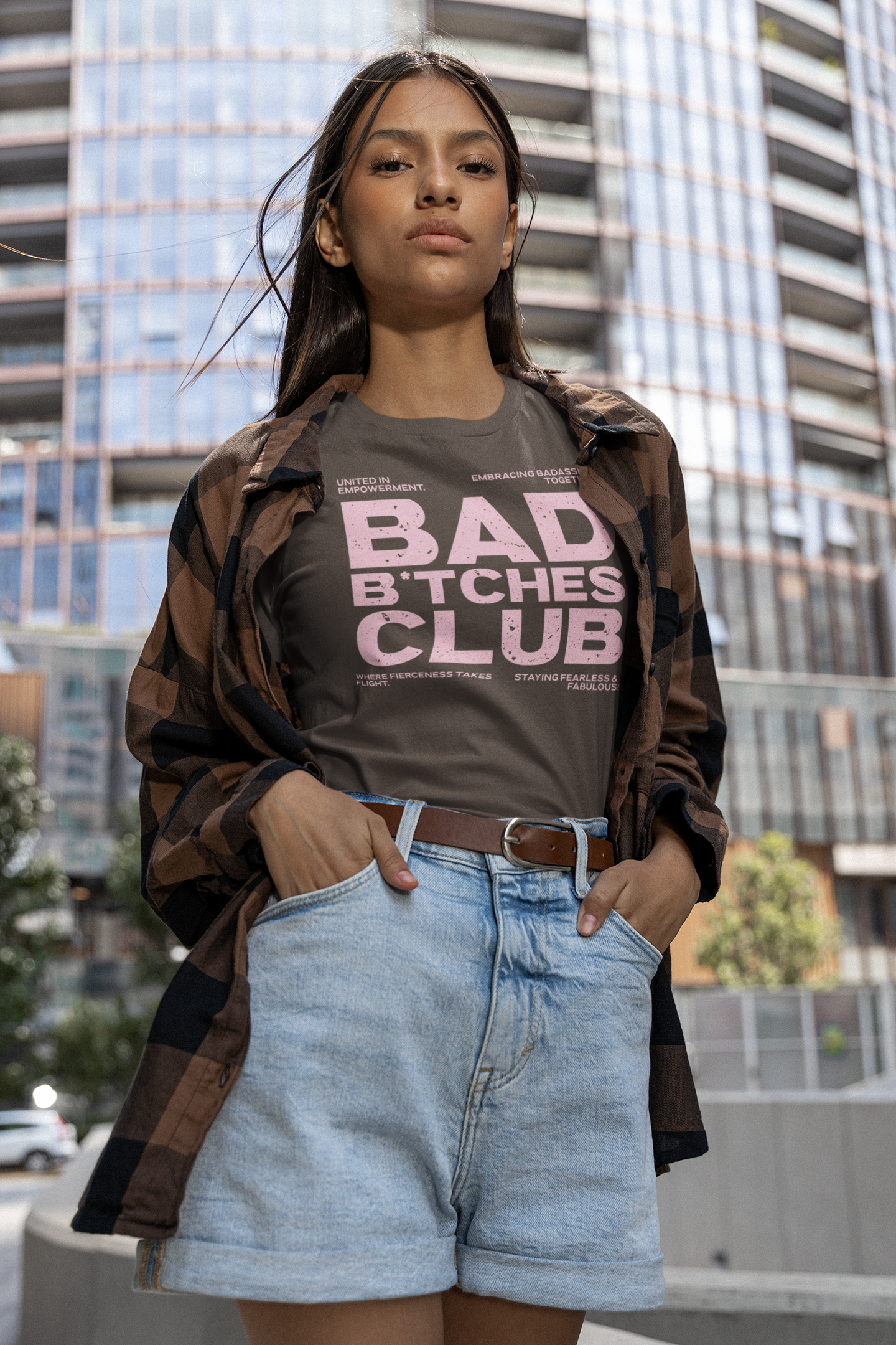 mockup-of-a-woman-posing-in-a-round-neck-bella-canvas-tee-by-a-building-m29432.png