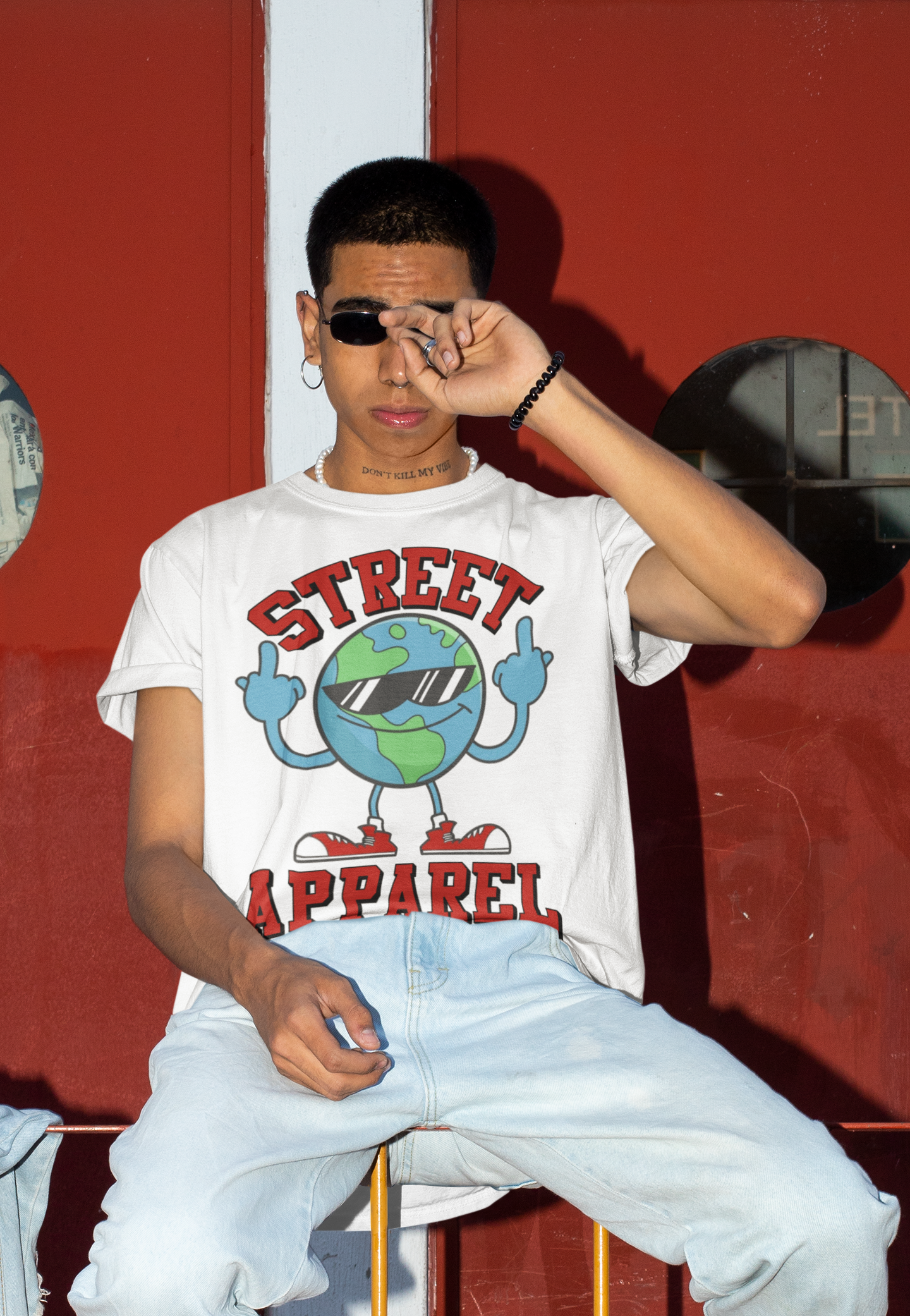 mockup-of-a-man-with-a-hip-hop-style-wearing-a-t-shirt-and-sunglasses-m577.png