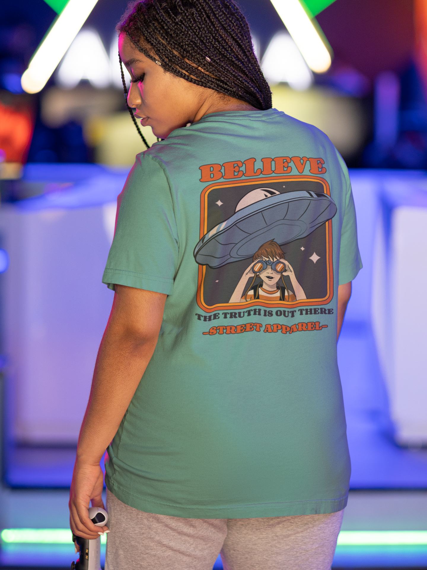 back-view-mockup-of-a-woman-wearing-a-tee-at-a-gamers-arena-m28546.png