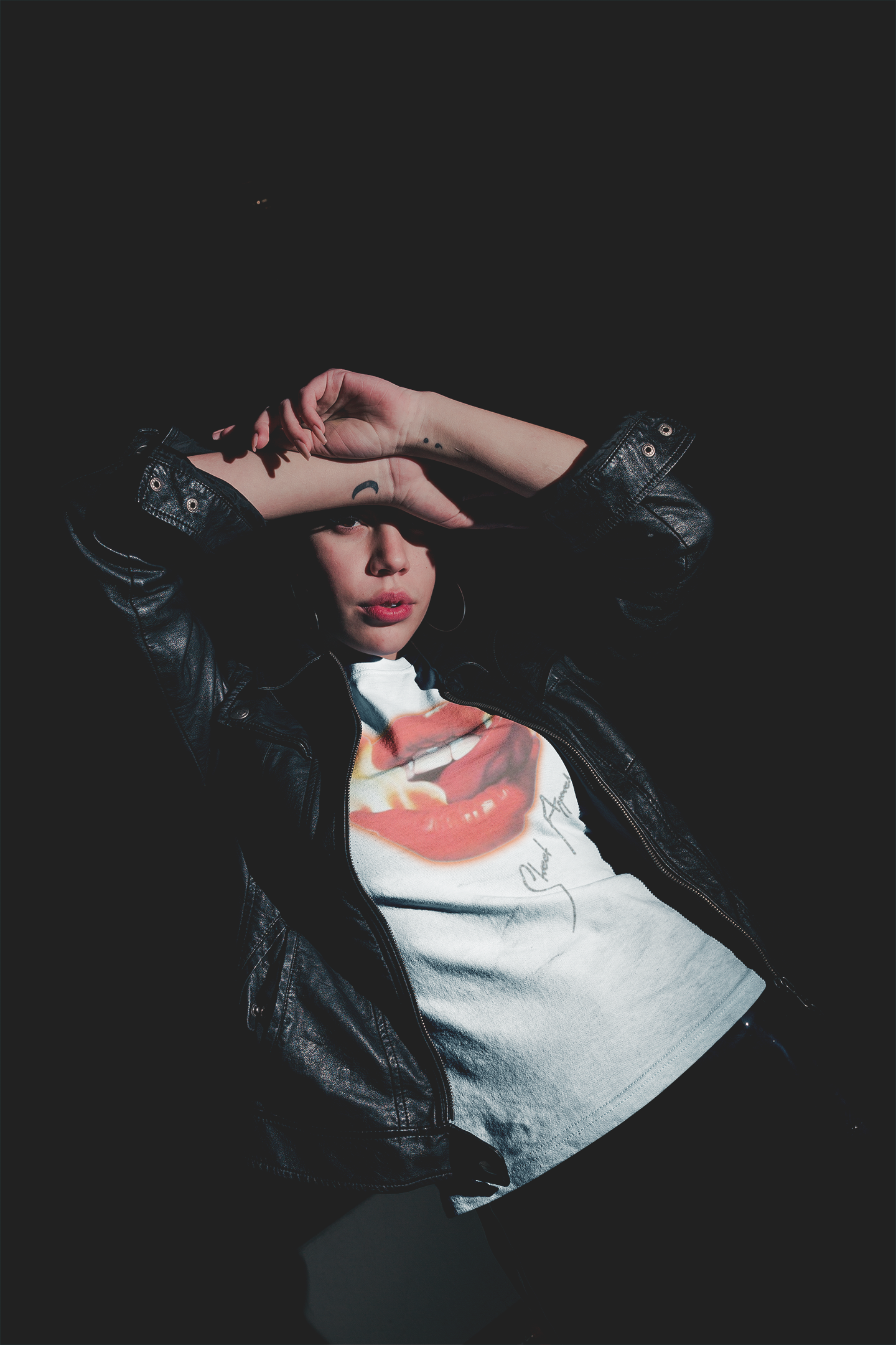 nightshot-t-shirt-mockup-of-a-girl-with-a-dark-leather-jacket-a18902.png
