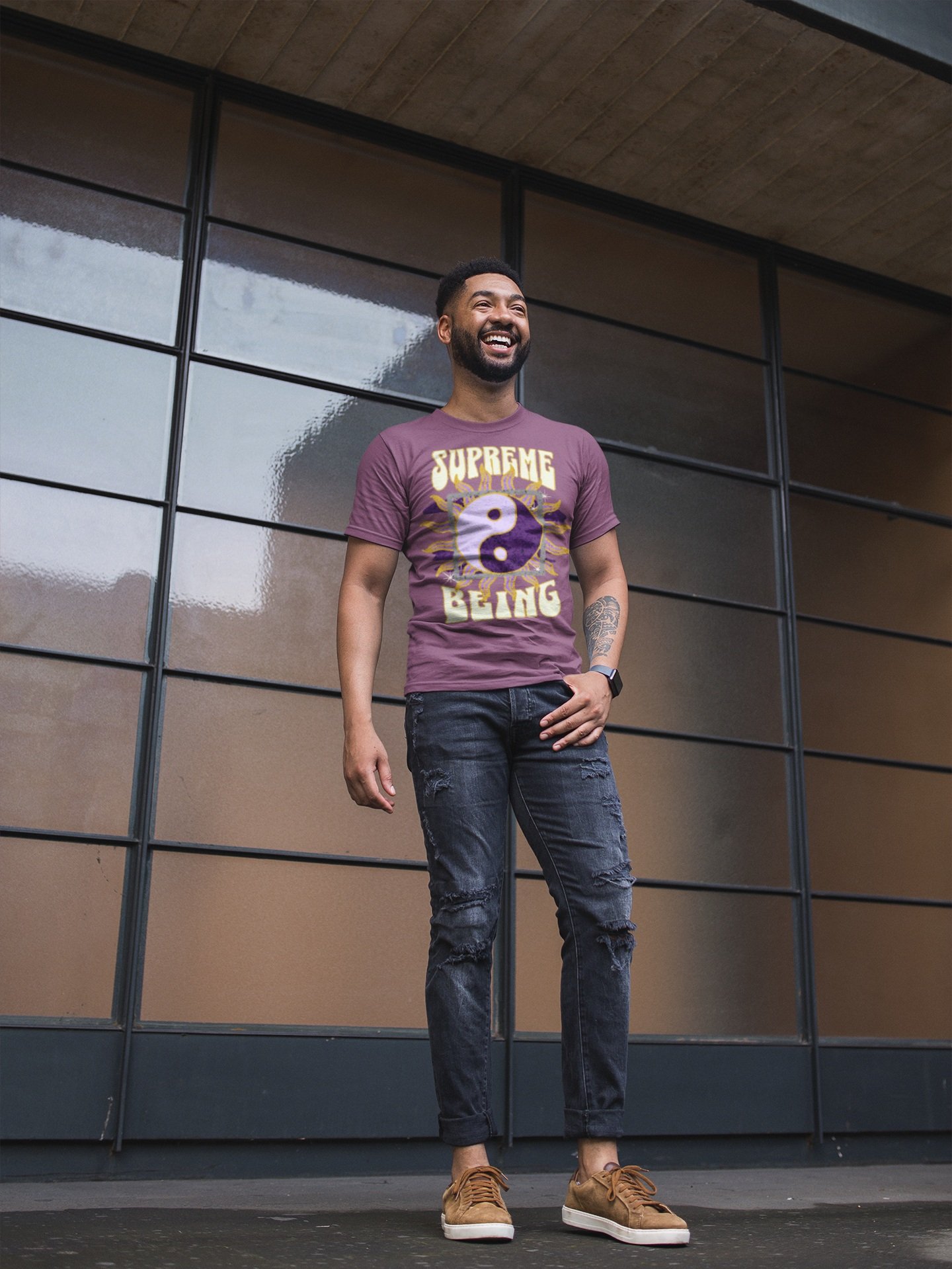 t-shirt-mockup-of-a-stylish-man-smiling-in-front-of-a-window-wall-21348.jpg