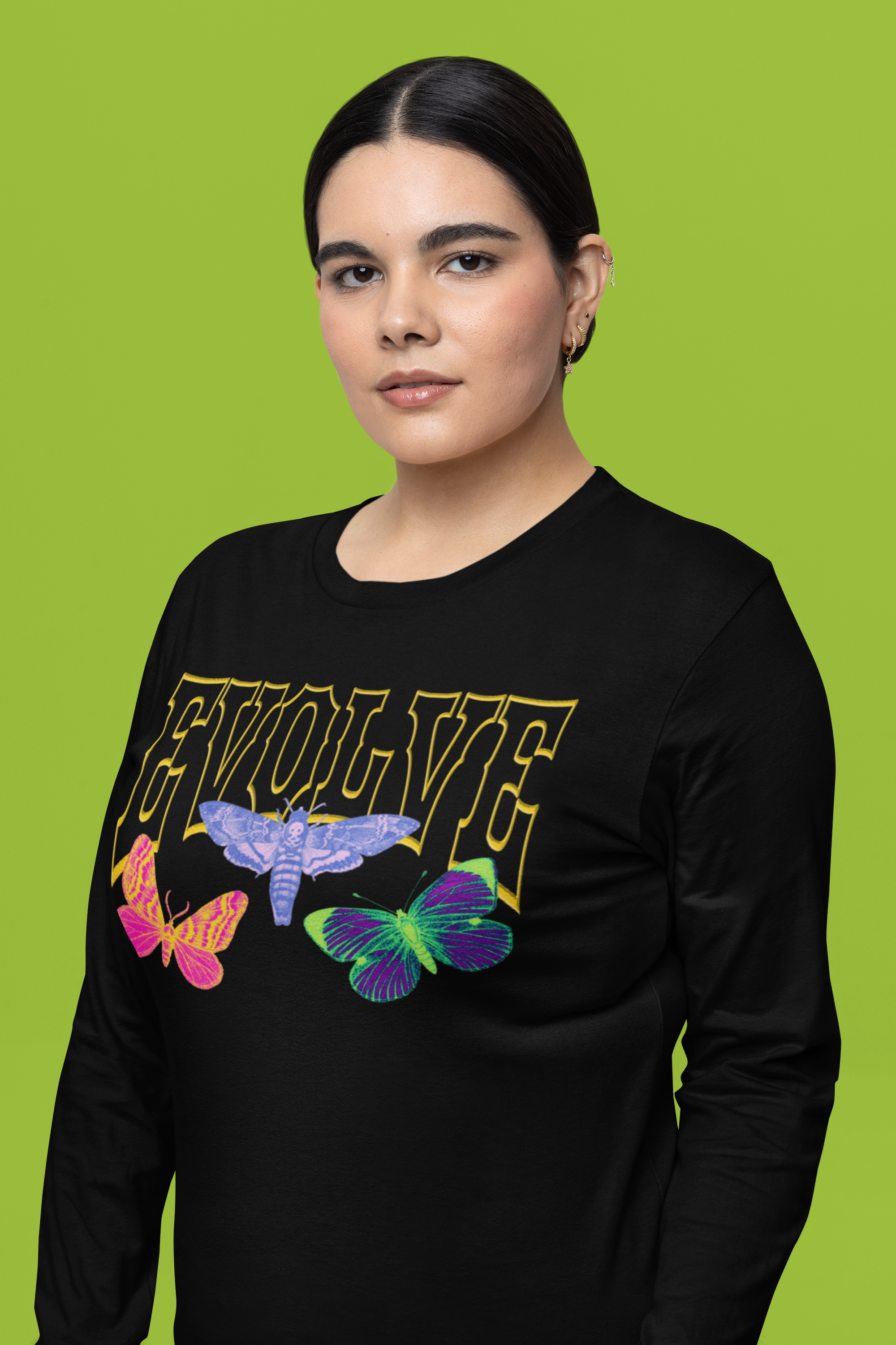 mockup-of-a-woman-wearing-a-bella-canvas-long-sleeve-tee-in-a-studio-m35134.png