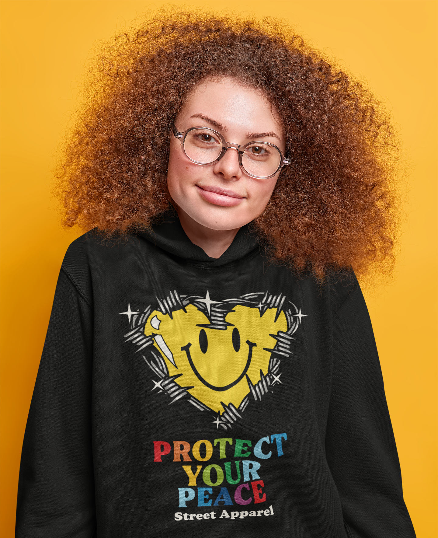 hoodie-mockup-of-a-curly-haired-woman-with-glasses-in-a-studio-m17857-r-el2.png