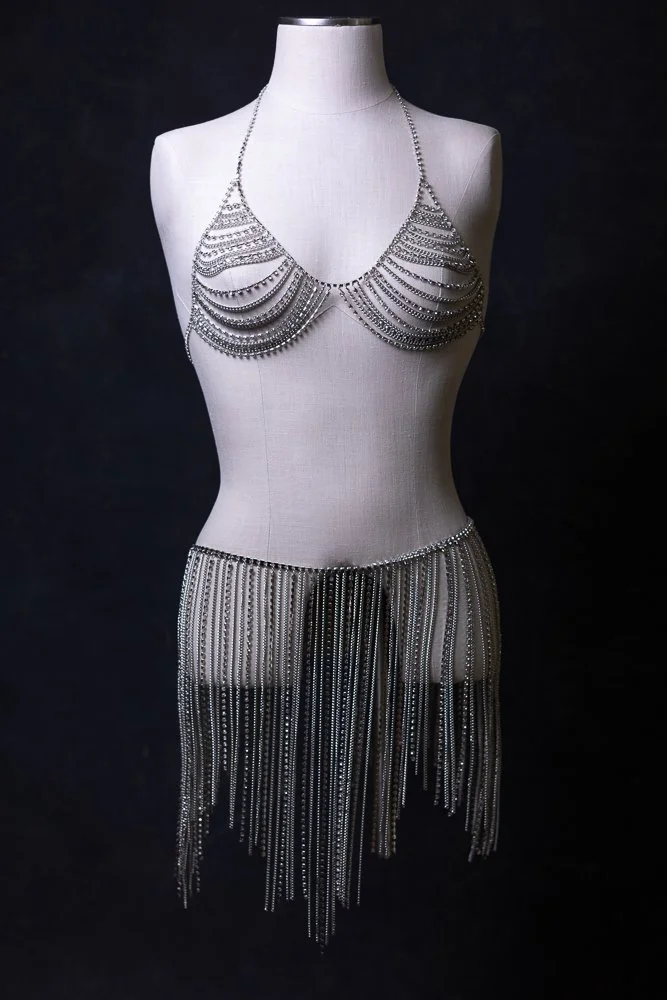 Beaded chain bra top and skirt on mannequin