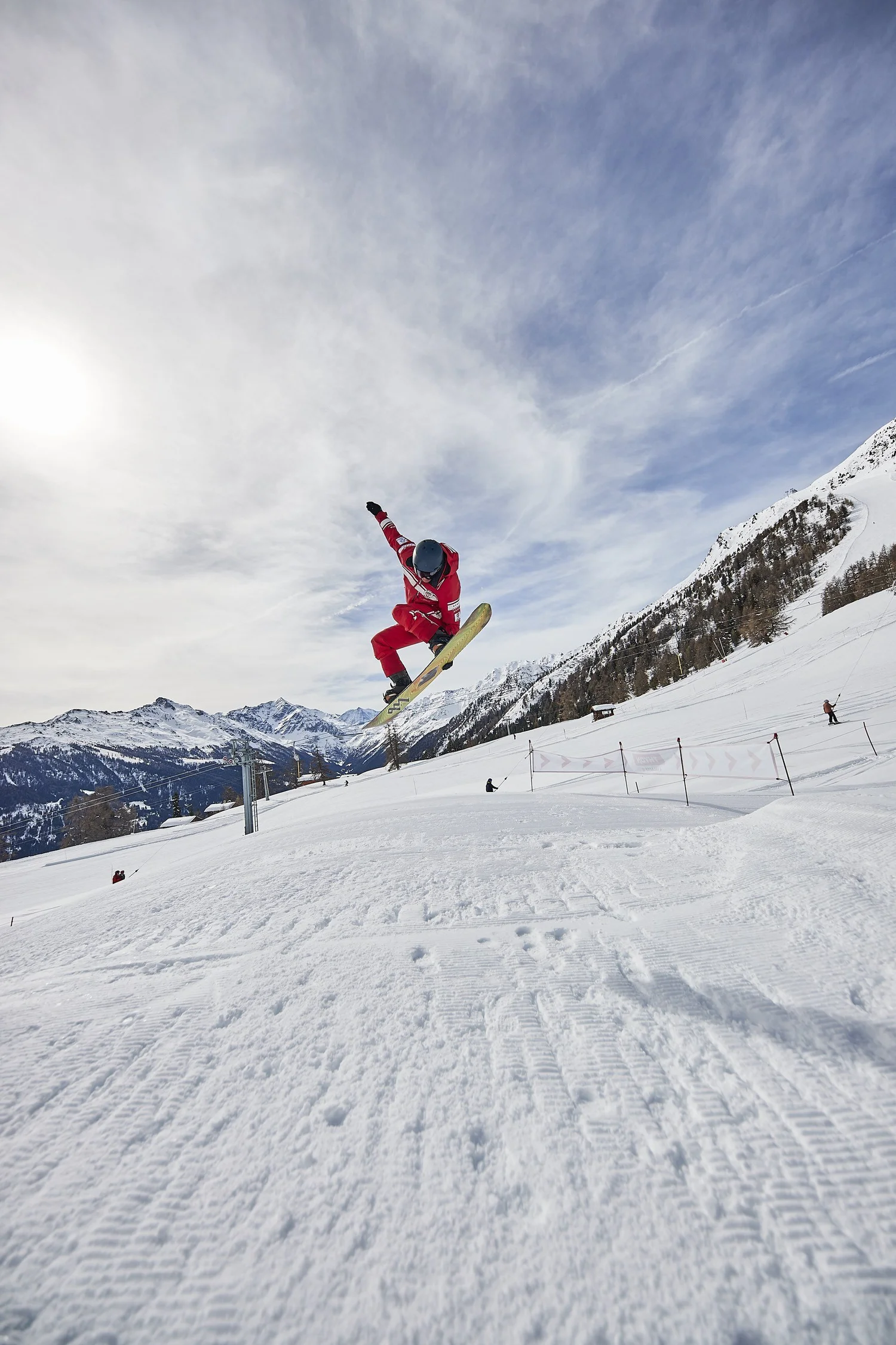 Skier descending through fresh powder — Snow series — photograph by Michaël Gramm