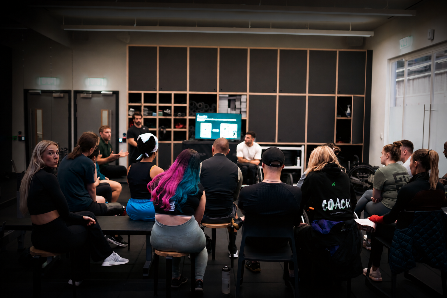 Fitness professionals attending a CIMSPA-endorsed adaptive training workshop at Pantheon Plymouth, participating in an inclusive coaching session focused on disability awareness, exercise adaptations and practical programme design.