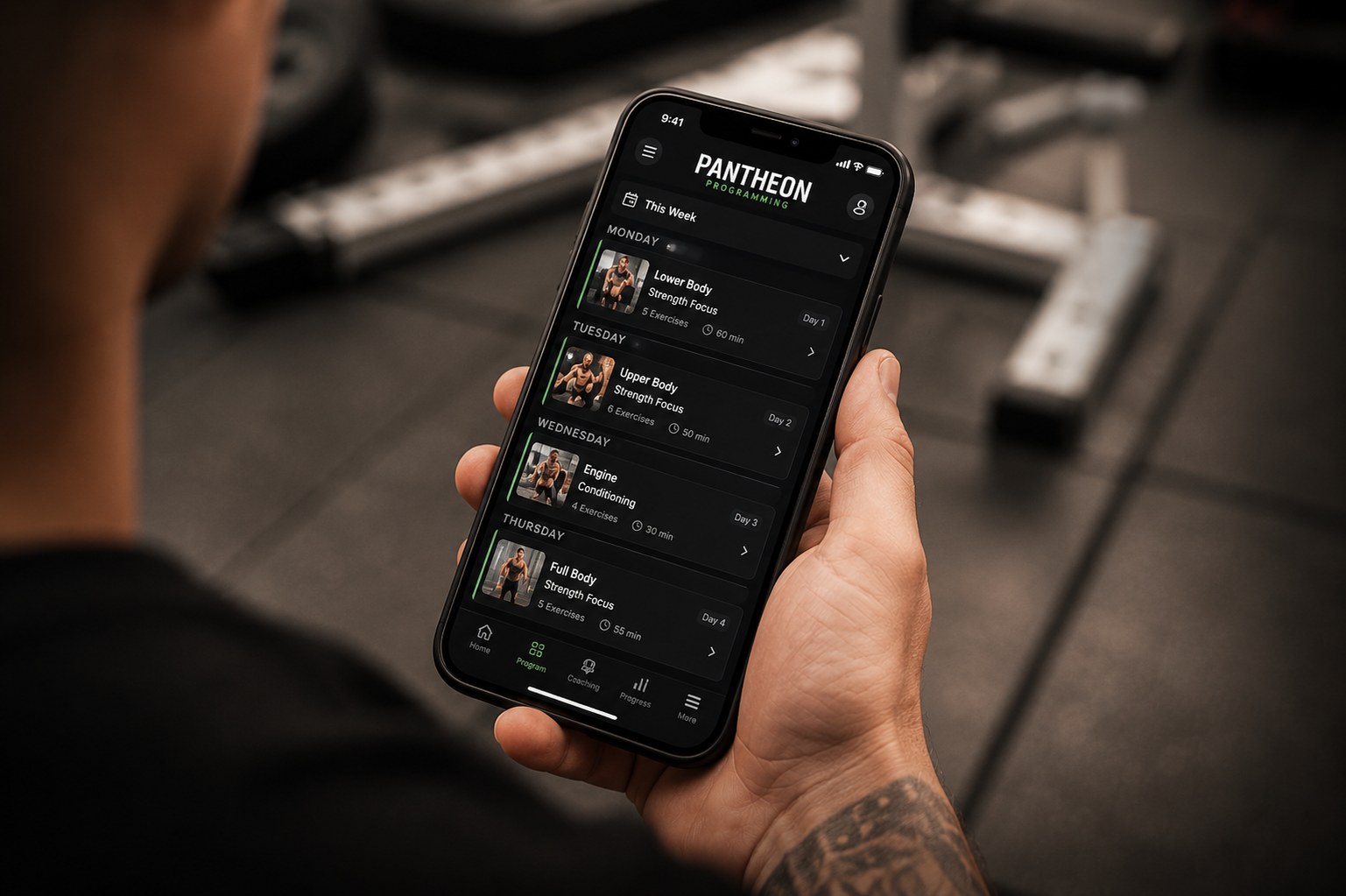Member viewing their personalised Pantheon Plymouth fitness programme on a smartphone app, showing scheduled workouts, progress tracking and coaching support.