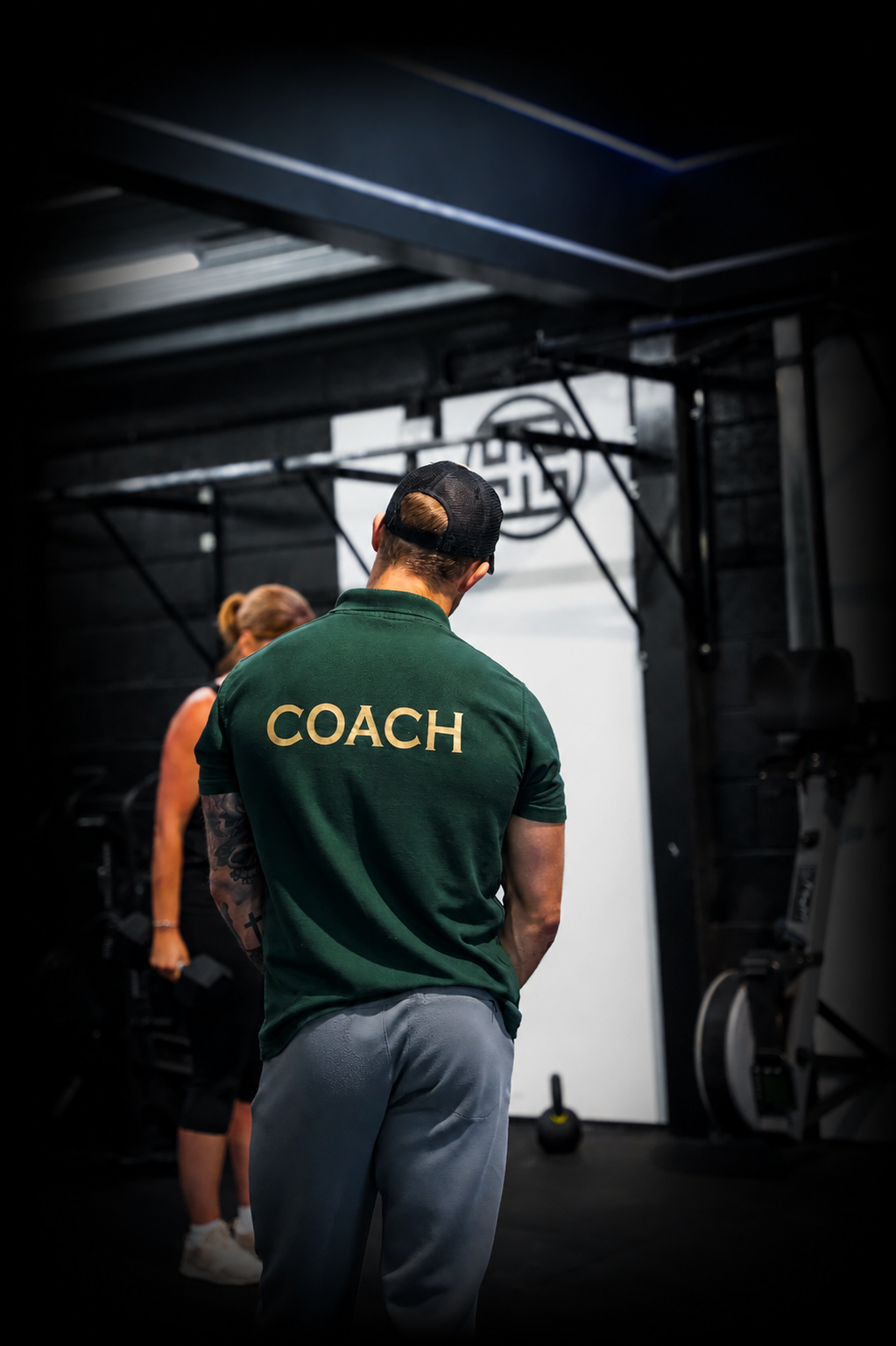 Pantheon Plymouth coach supervising a gym training session, providing expert guidance and personalised support to help members achieve their fitness goals.