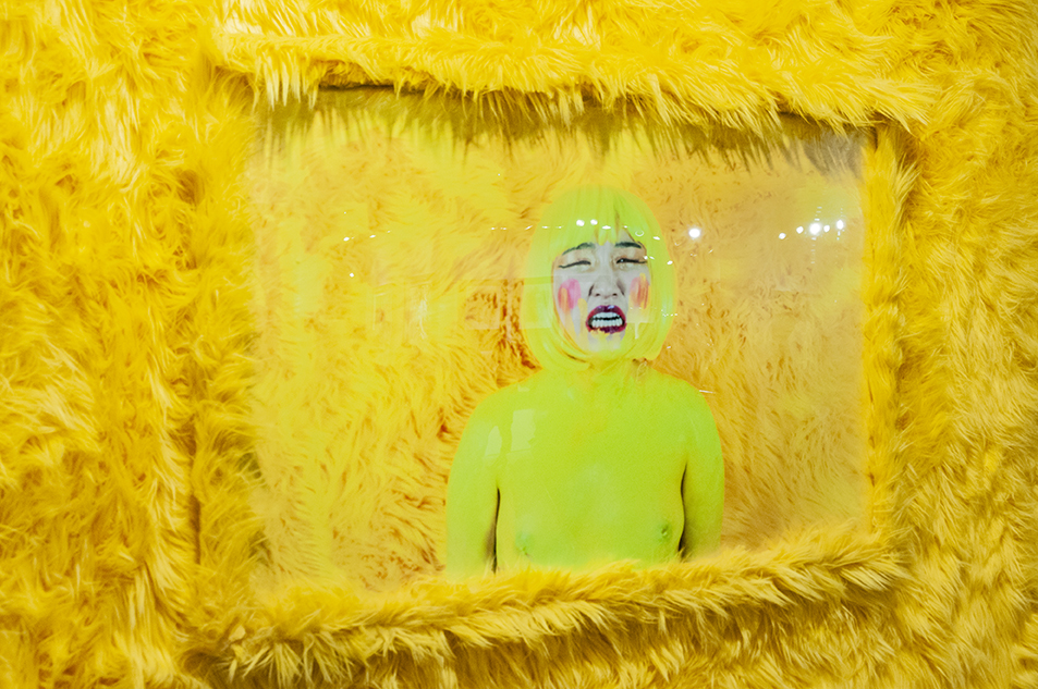  I DARE YOU TO BUY ME II   Photography Installation: Archival prints, yellow shag fur frame, yellow shag fur.  2019 LA Art Show Installation View. 