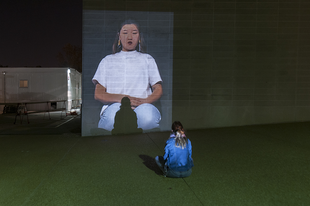  I Am Kneeling.&nbsp;  Public art installation of a 132 x 96 inch projection on the facade of Walker Hall at Washington University at St. Louis.&nbsp;  Installation view.&nbsp; 