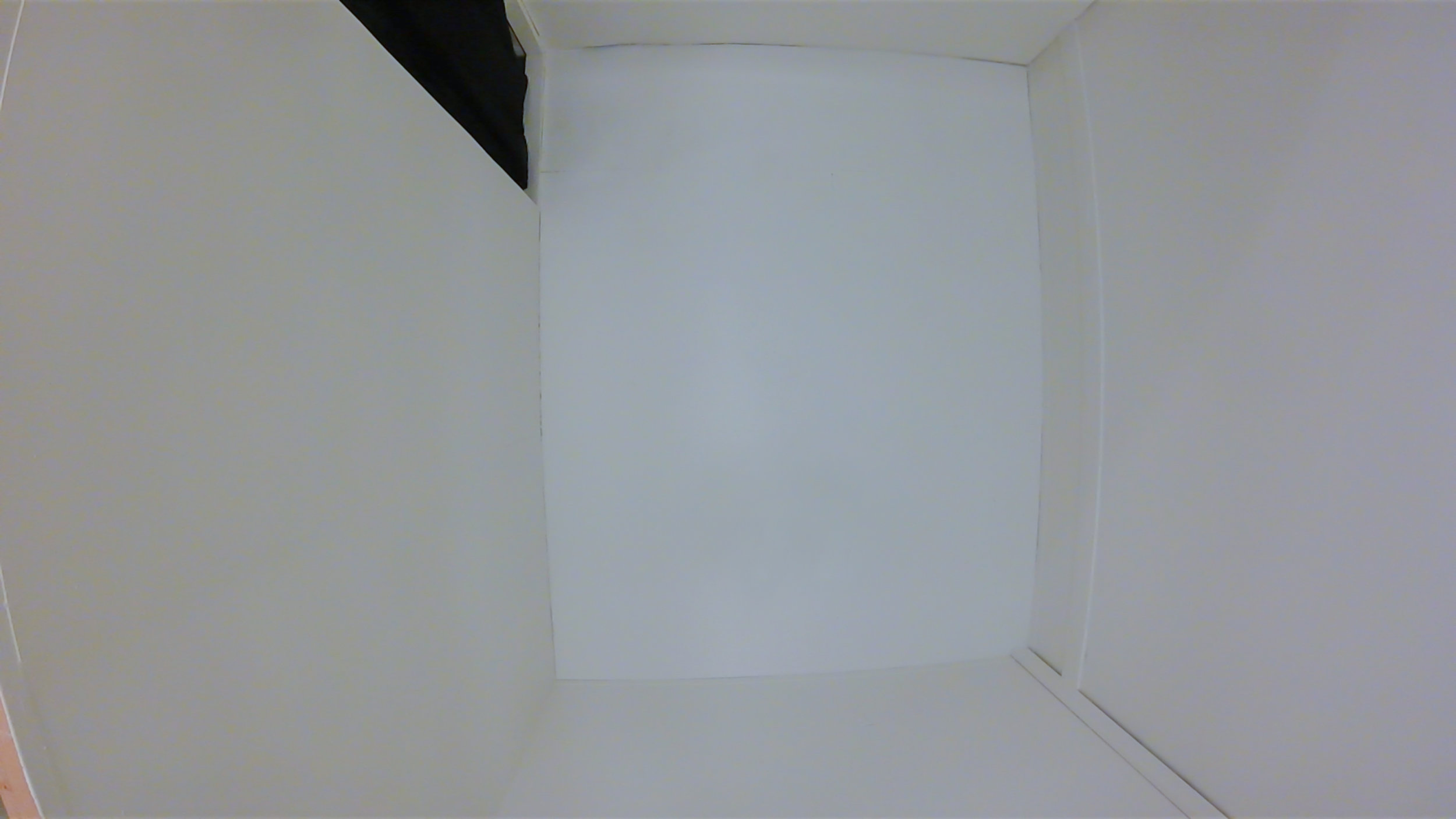  Marking. (FINAL state)  Multimedia installation: white painted constructed room.  96x125x96 inches.  Installation view. 