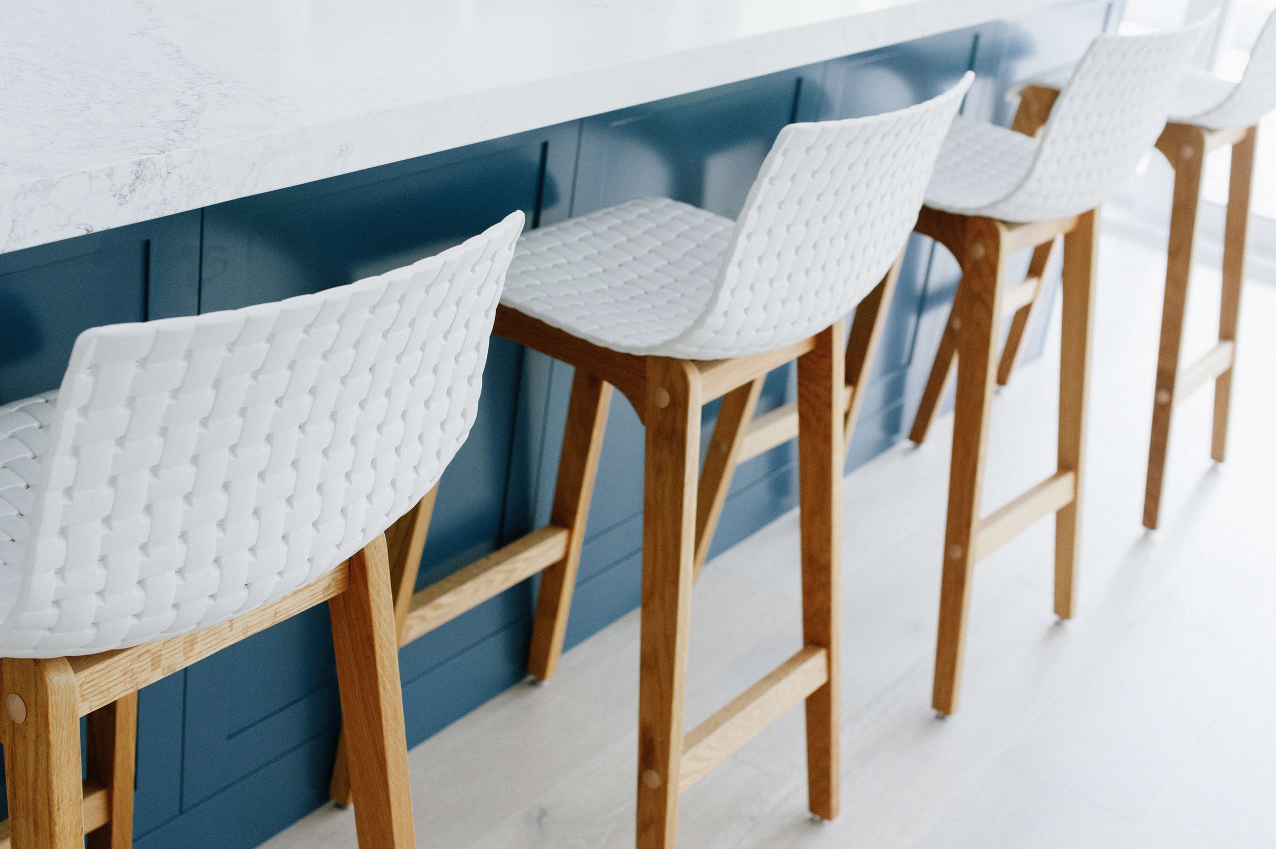 Interior Design Hamptons kitchen navy and white stools