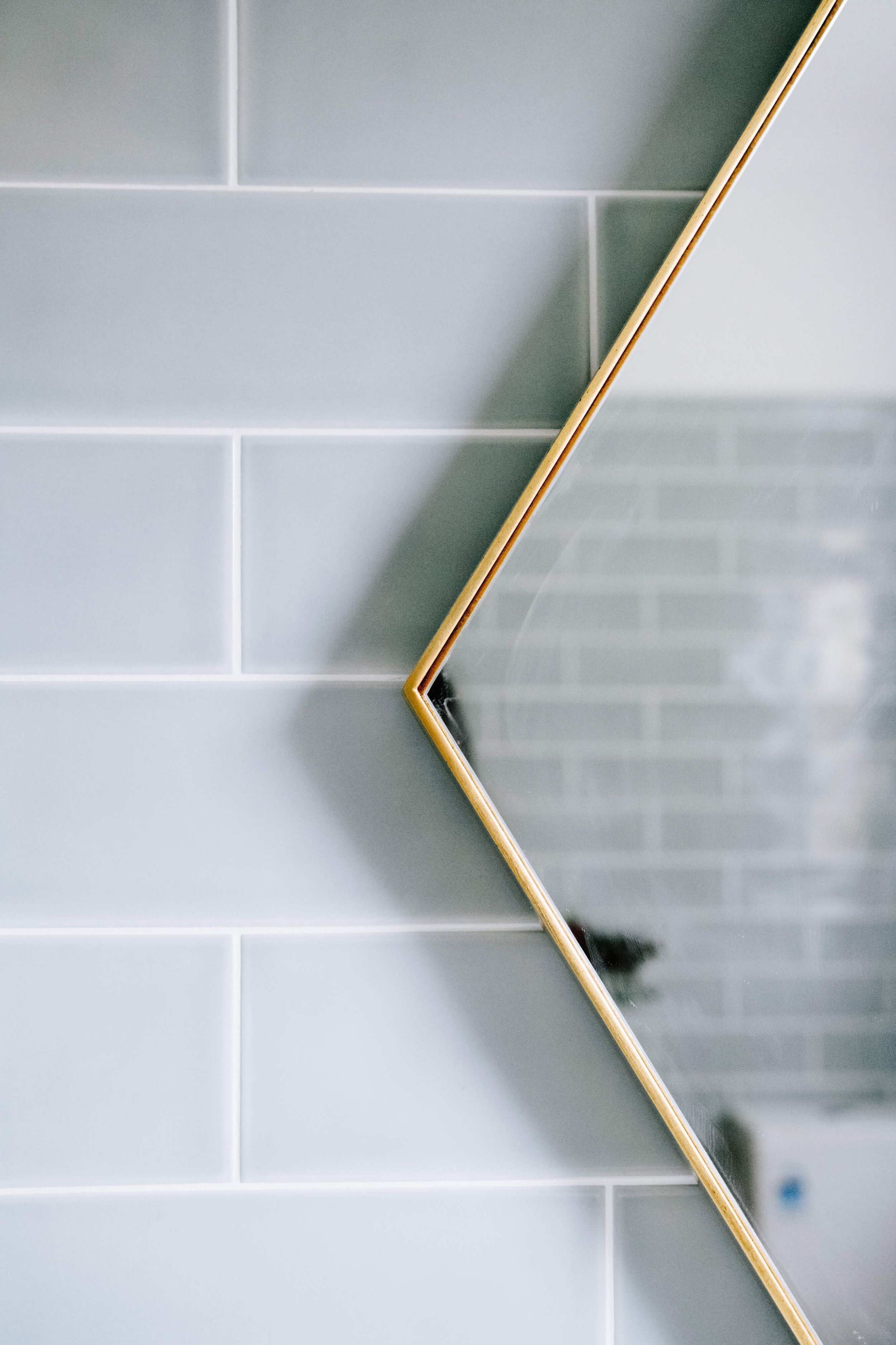 Interior styling Art deco master bathroom styling brass mirror