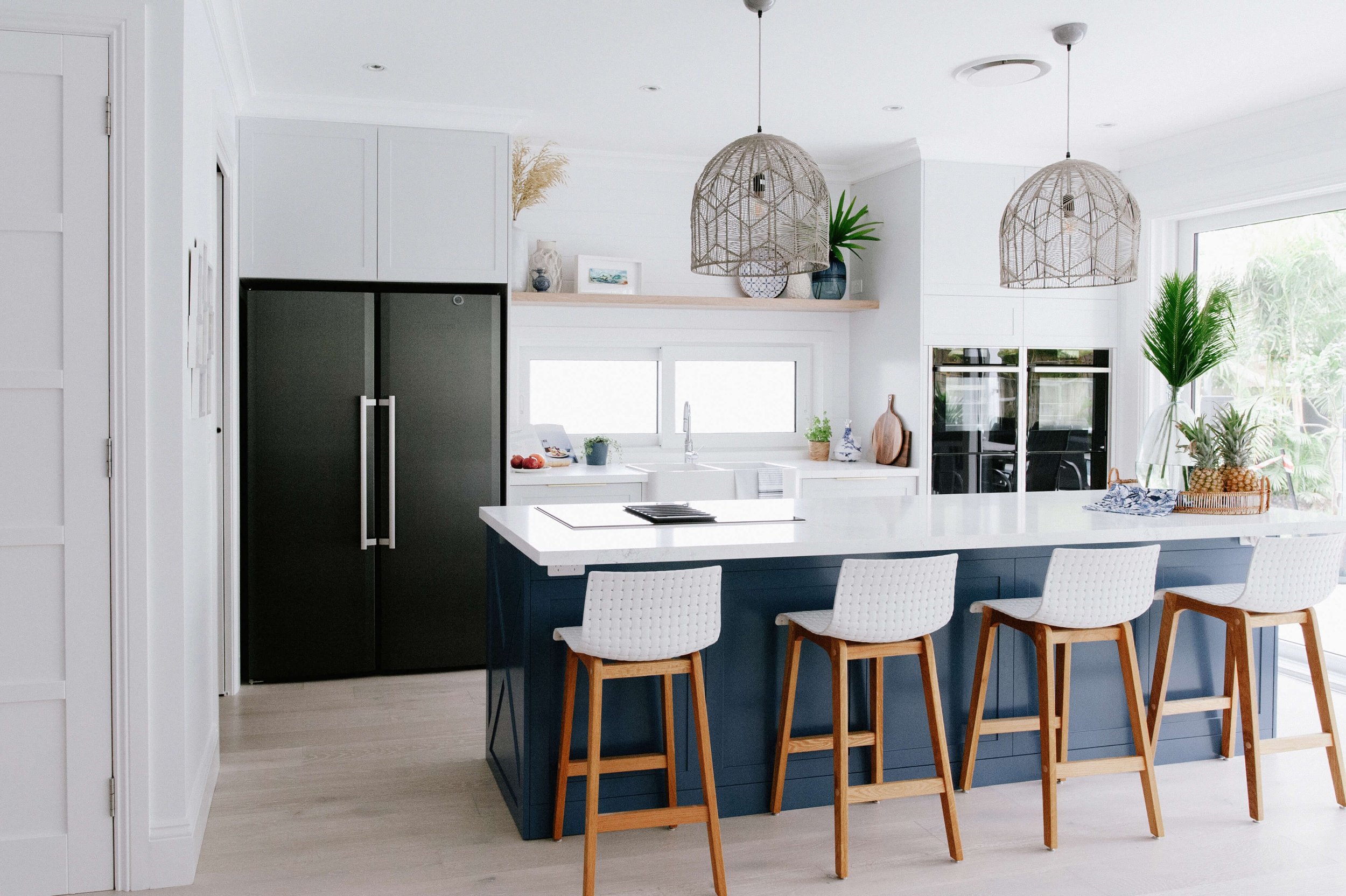 Interior Designer Case Study - Hamptons kitchen navy and white interior styling