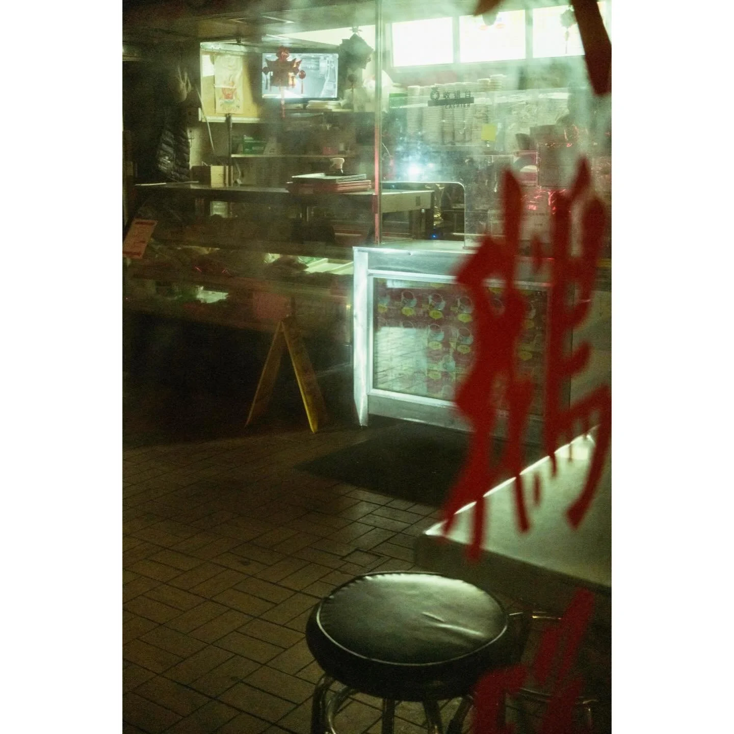 Some nighttime shots from around Chinatown in Manhattan this winter. There&rsquo;s something about the colors of the light and reflections in that neighborhood. #nycstreetphotography #fujifilmstreet  #fujixfam #nightphotography