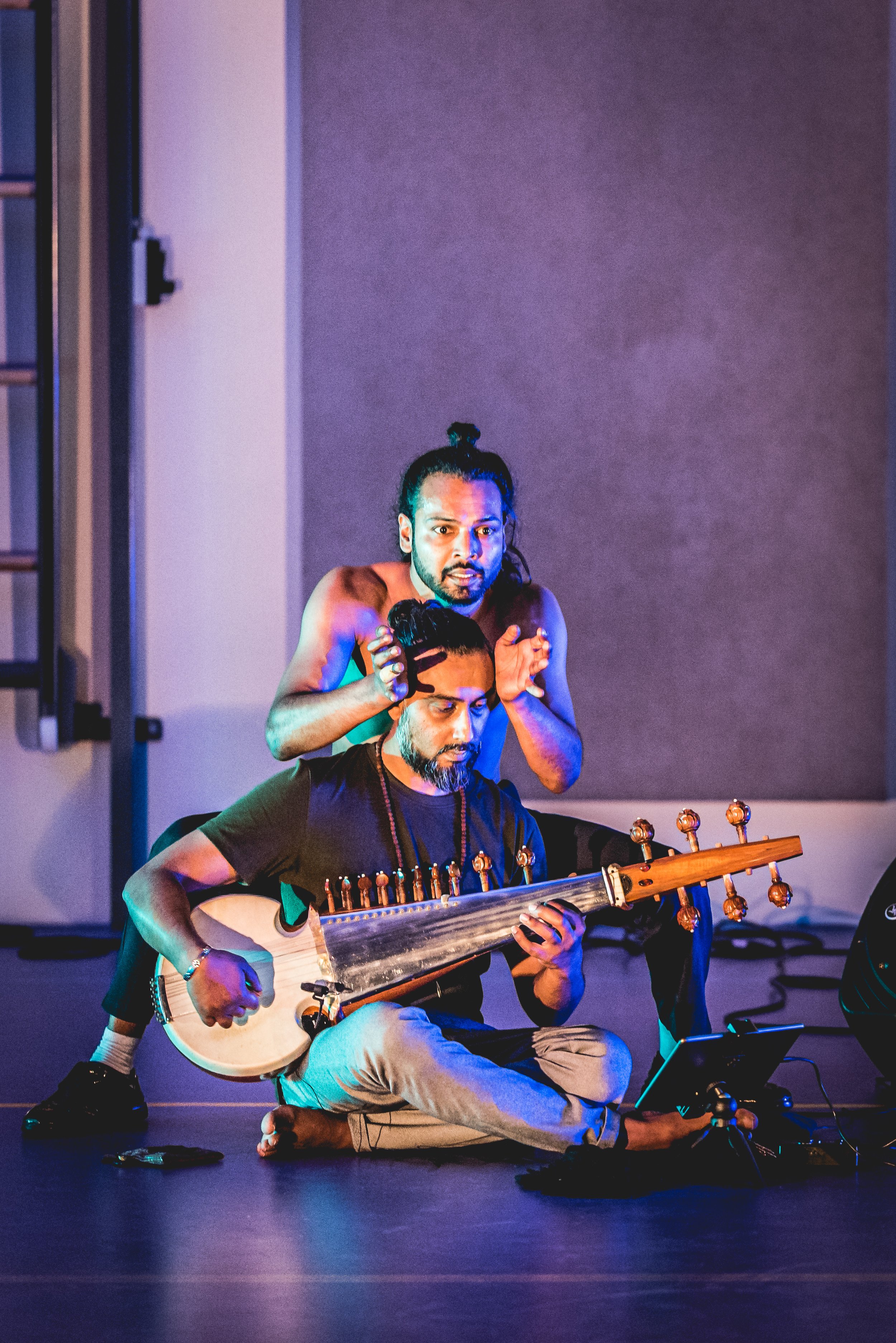 Avi Kishna performing sarod alongside vocalist Raj Mohan.