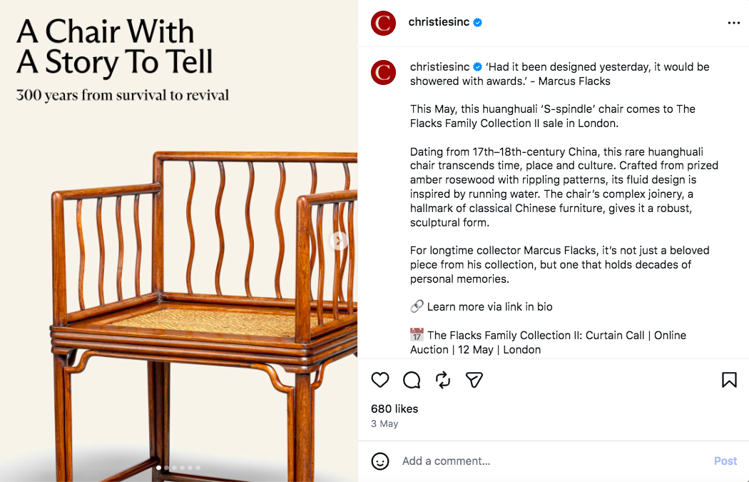 A brown, minimalist-style huanghuali chair from 17th-18th-century China. It's made from amber-toned wood with wavy lines and sleek edges.