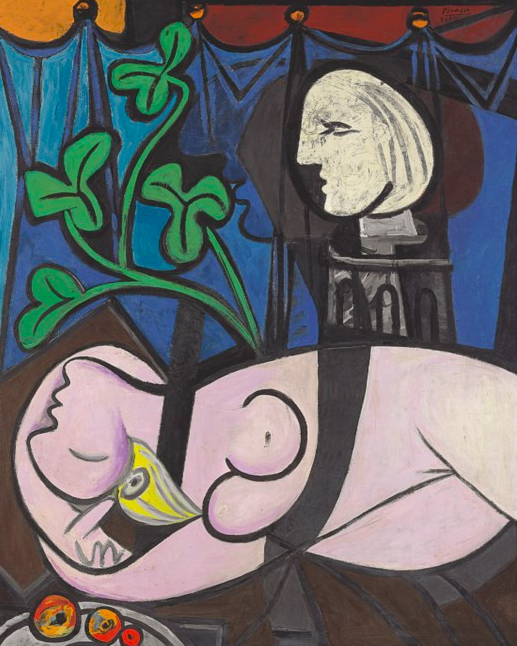 Bold, abstract Picasso painting with a lilac female figure lying nude, with a plate of fruit, green plant and statue head against blue curtains.