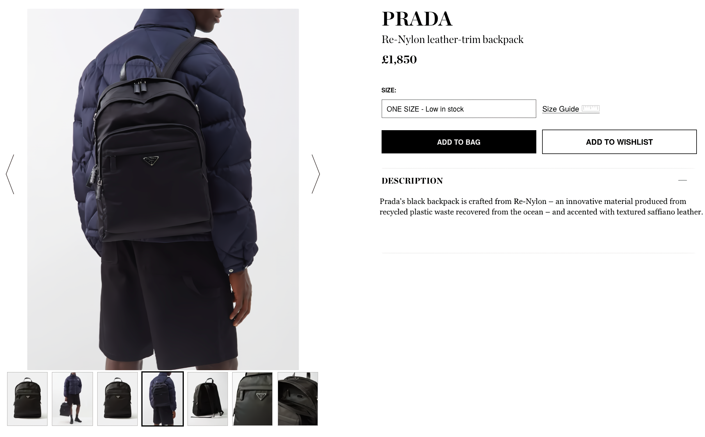 Prada men's black Re-nylon backpack with a model wearing a navy puffer jacket and black shorts.