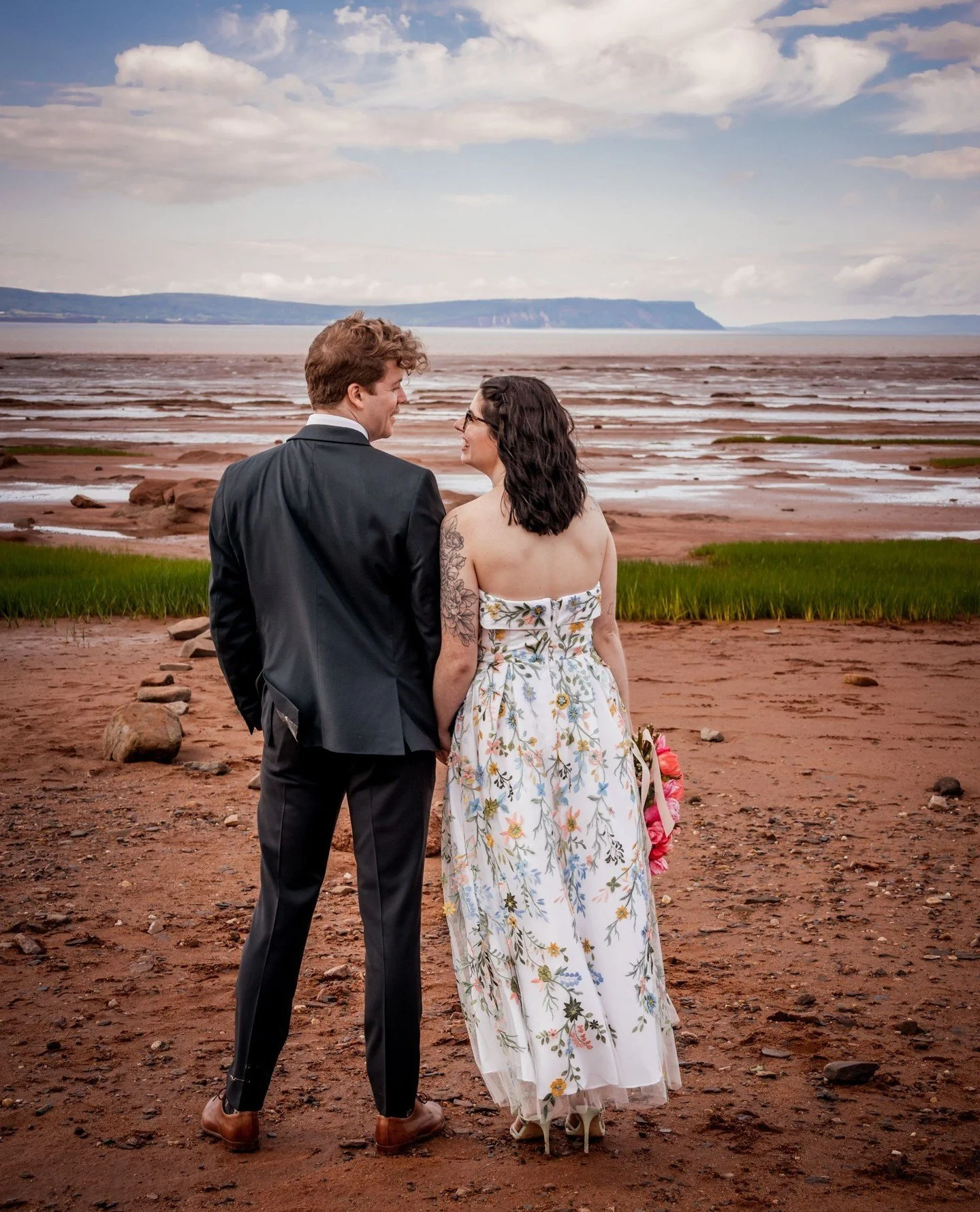 I can't get enough of this beautiful wedding!  The couple was staying at @thebreezemotel and got married with @married_byshannon on the beach in front of the motel.  The weather was perfect even though it had been questionable leading up to the big m