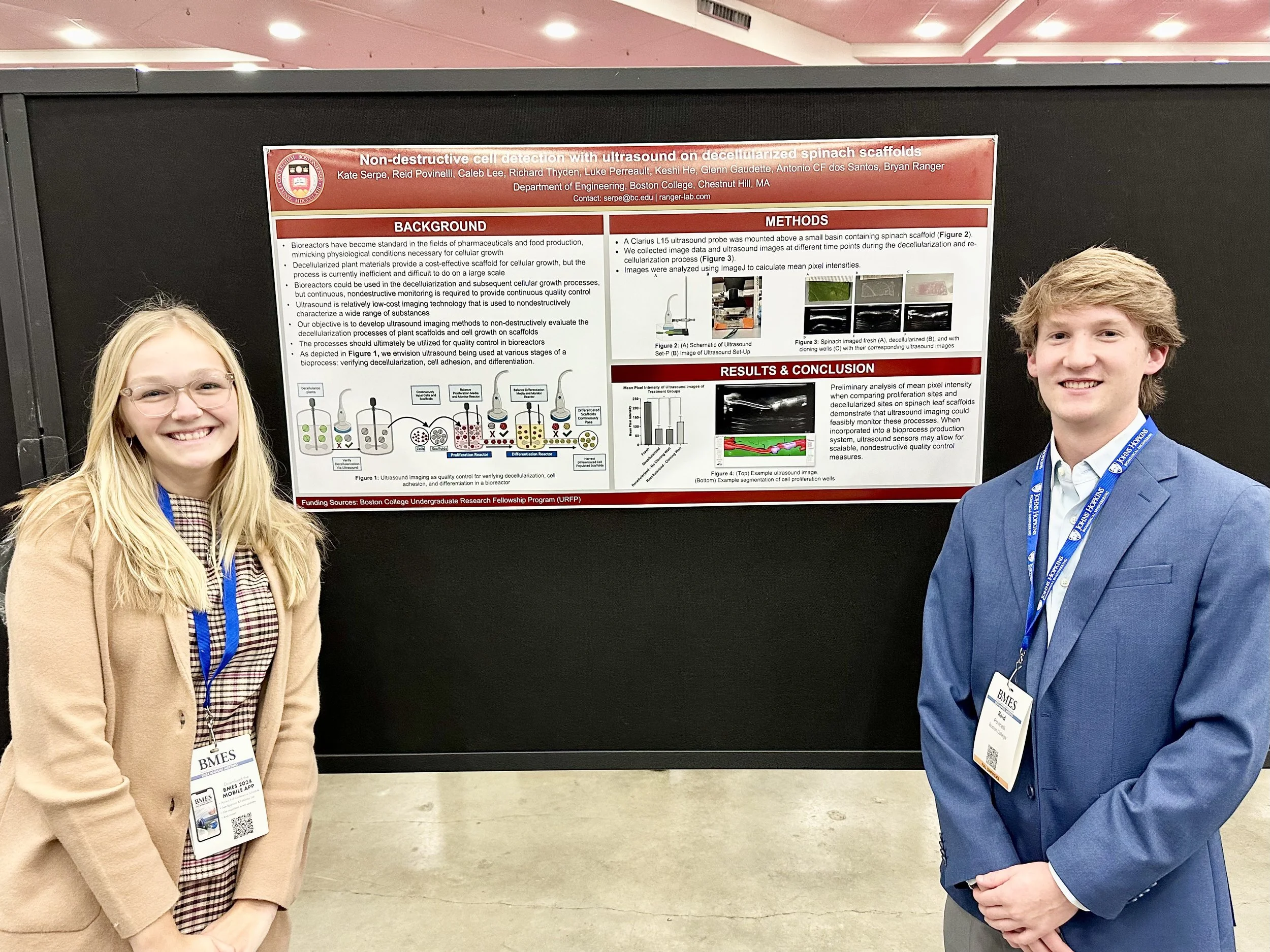 Kate Serpe and Reid Povinelli presenting their research