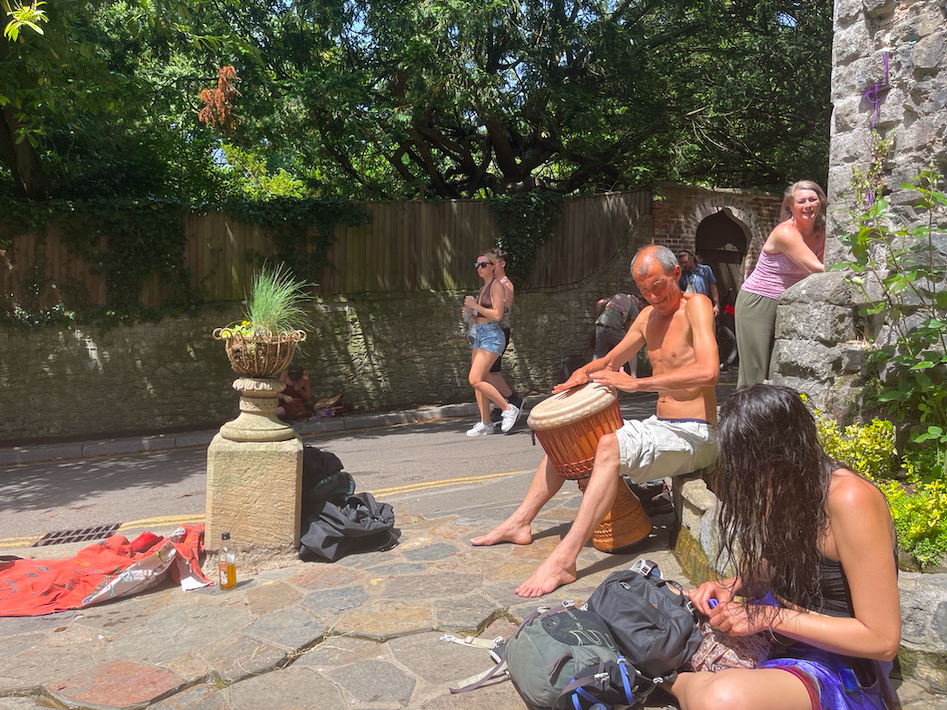 Pilgrims outside the White Spring Temple.png